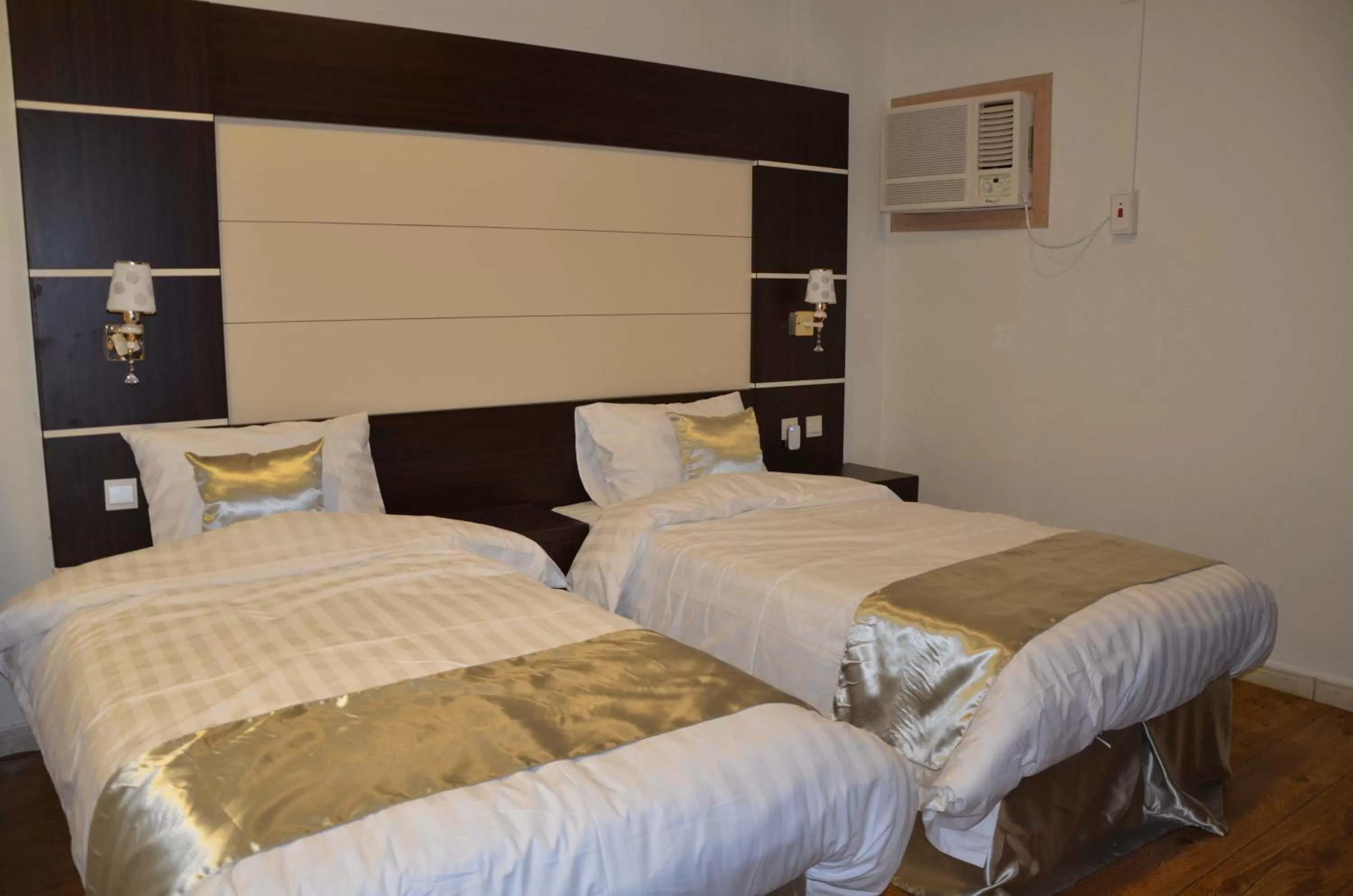 Bed in Jazan Heart Hotel