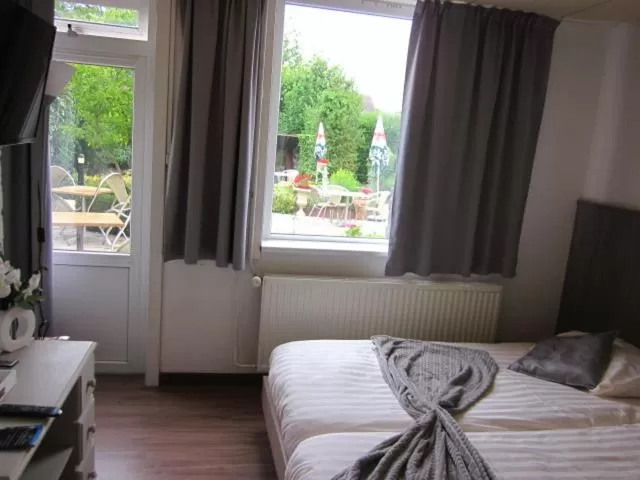 Bed in Hotel Le Provencal