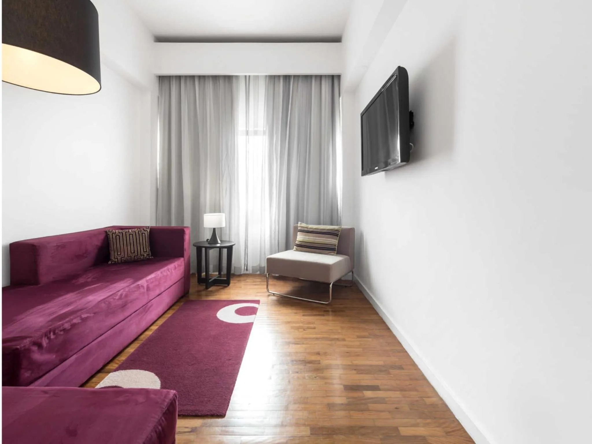 Living room, Bed in Hotel Tivoli Maputo