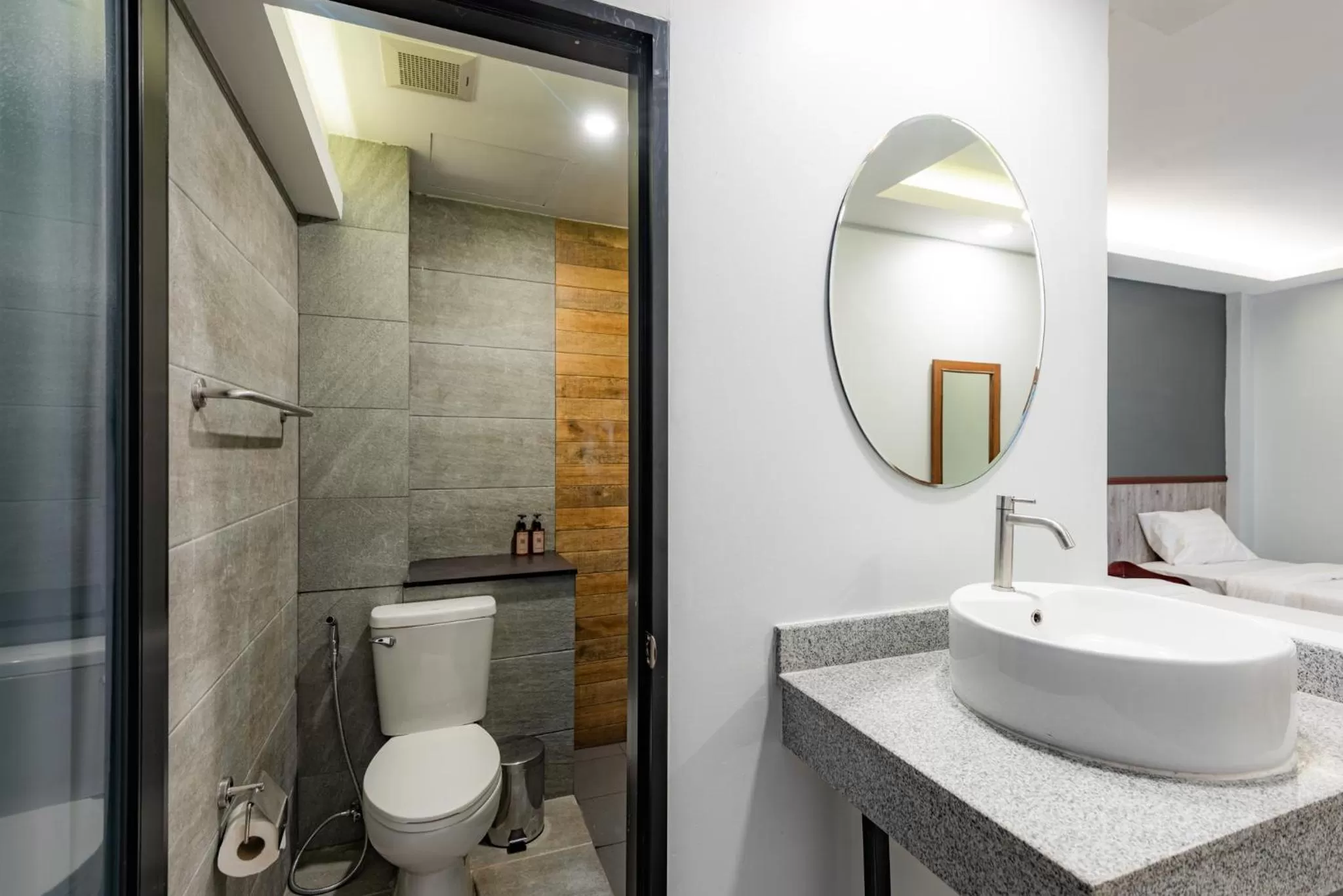 Bathroom in Luck Thai Hotel