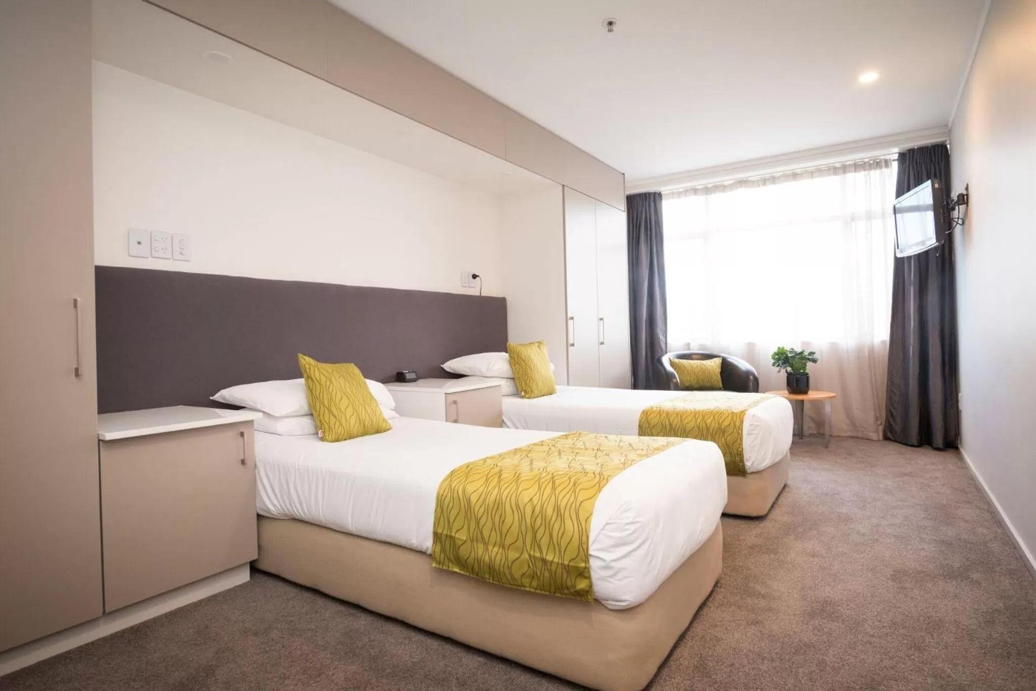 Bed in Quest on Johnston Serviced Apartments