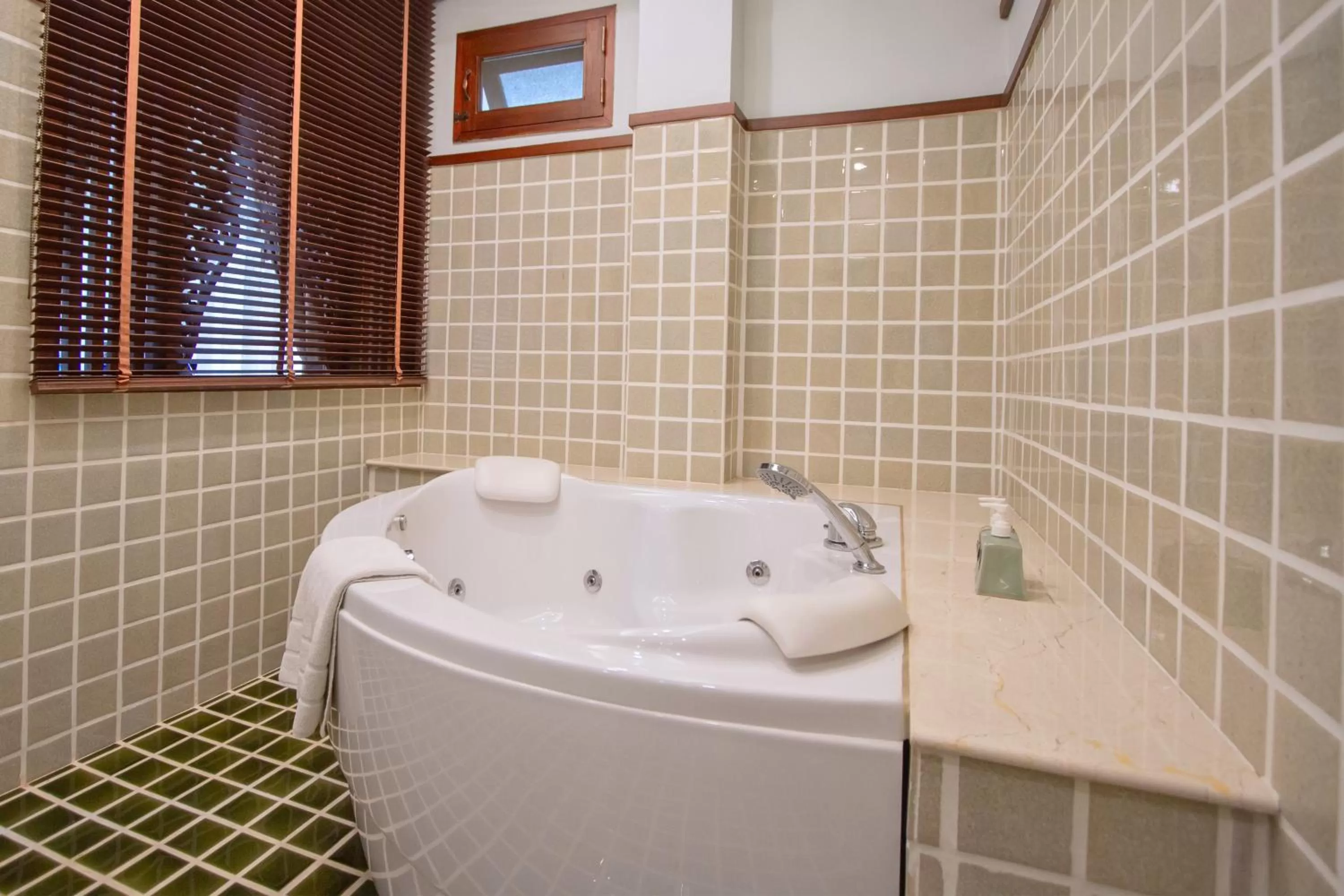 Bathroom in Rich Garden House Hotel