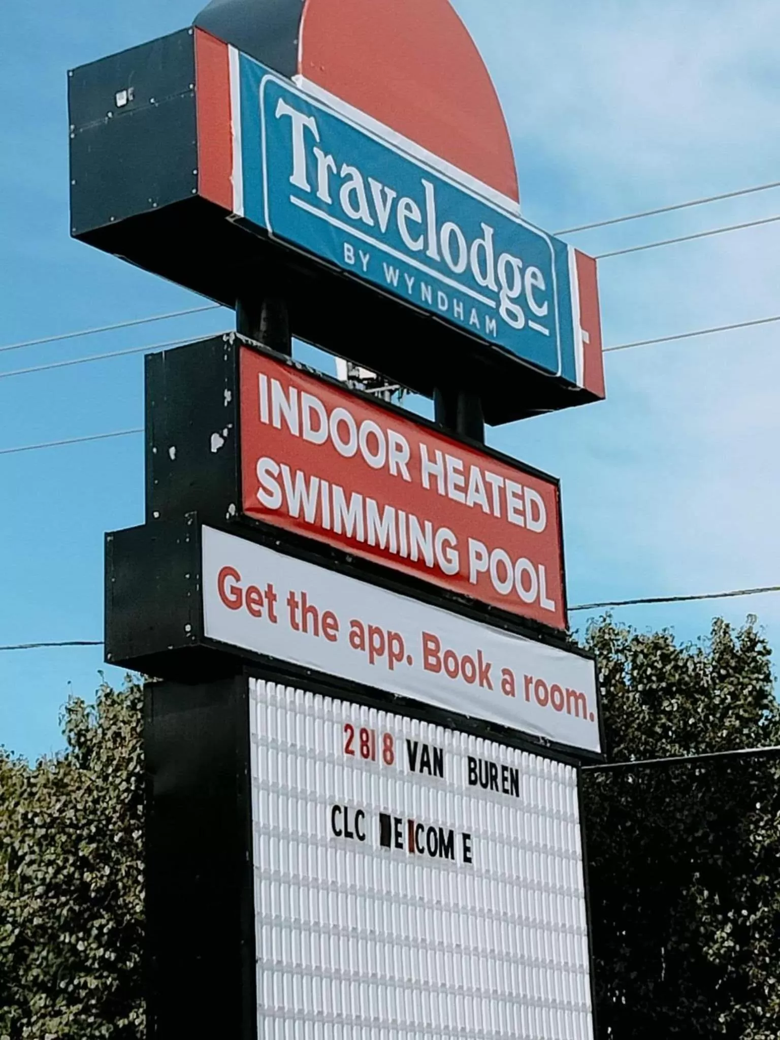 Property logo or sign in Travelodge by Wyndham Enid