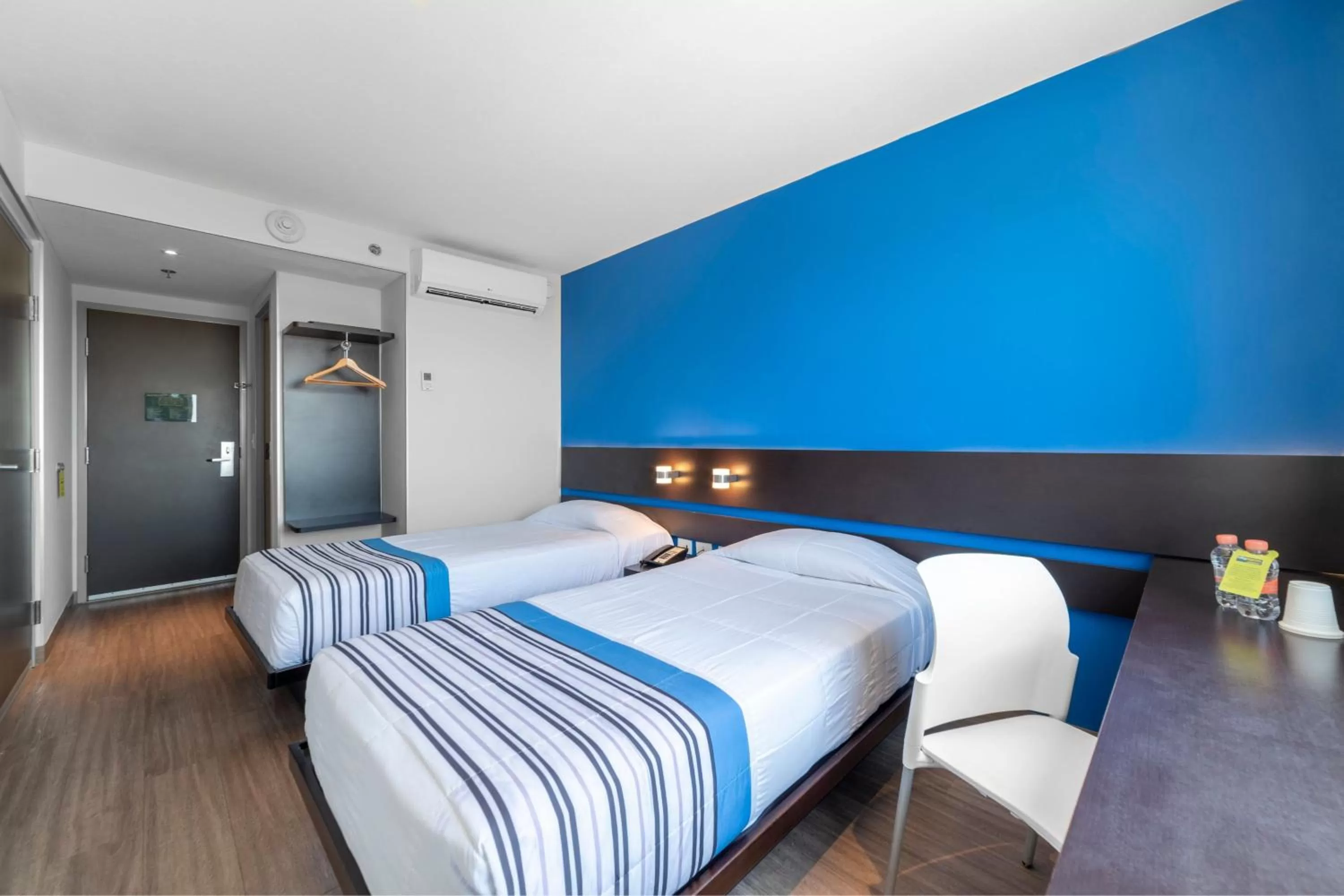 Bedroom, Bed in City Express Junior by Marriott Merida Altabrisa