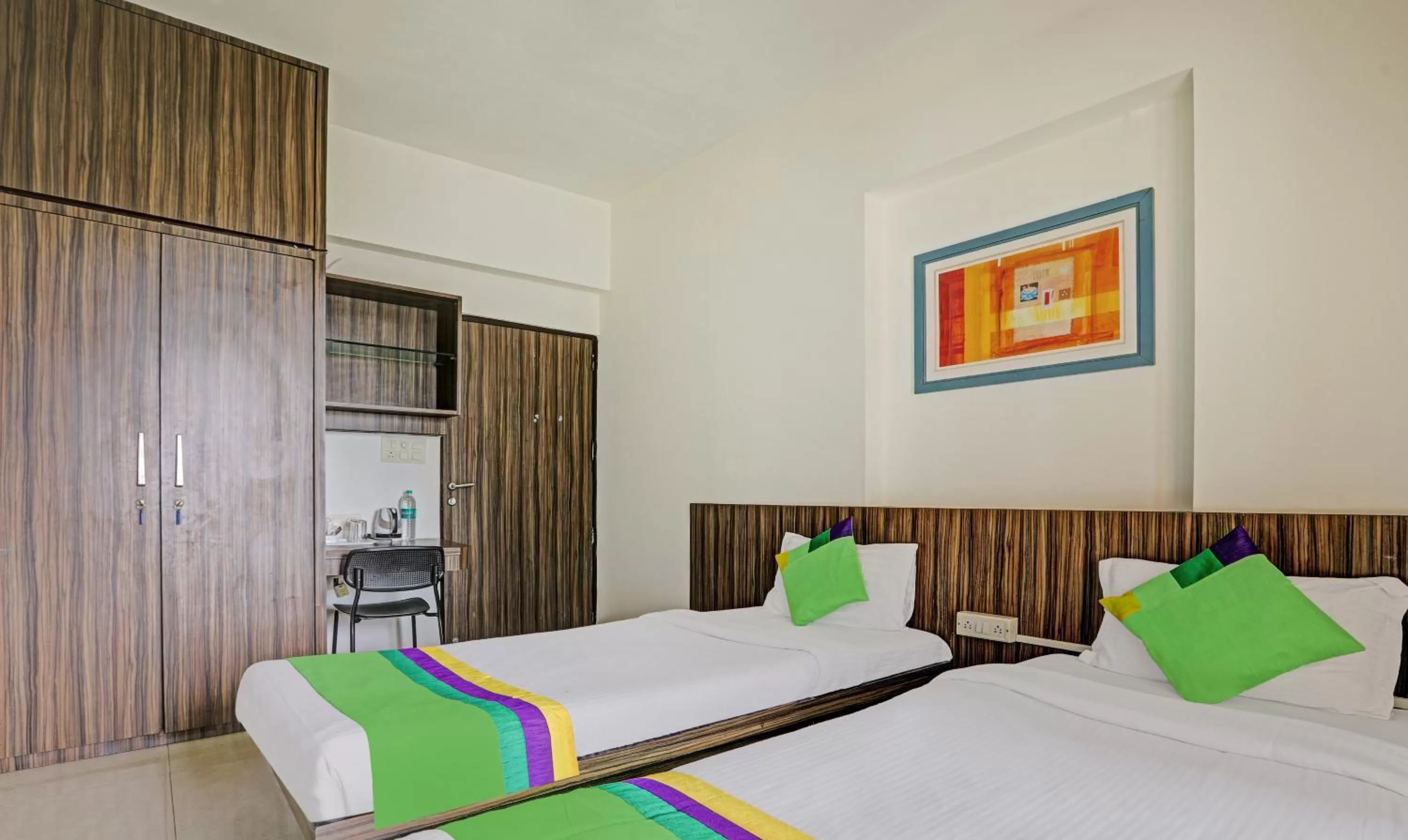 Bed in Treebo Trend Welcome Apartments