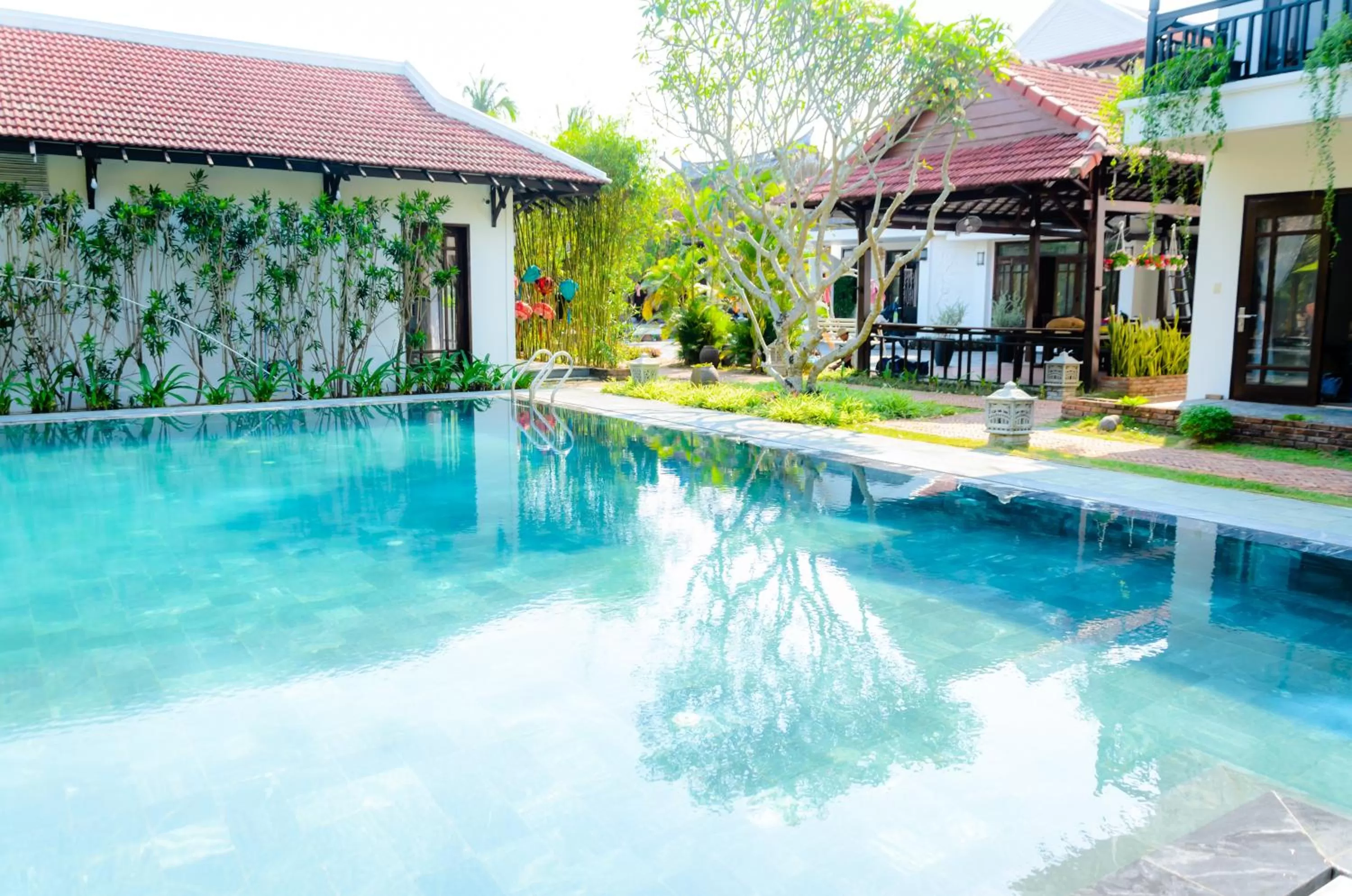 Swimming pool in Riverside Bamboo Resort Hoi An