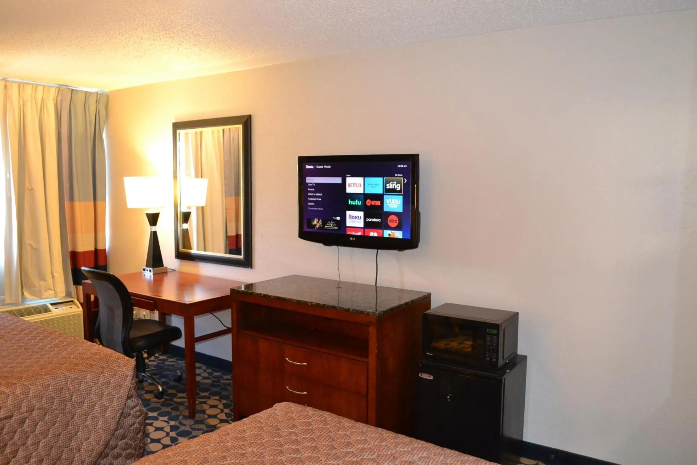 TV and multimedia, TV/Entertainment Center in Econo Lodge and Suites
