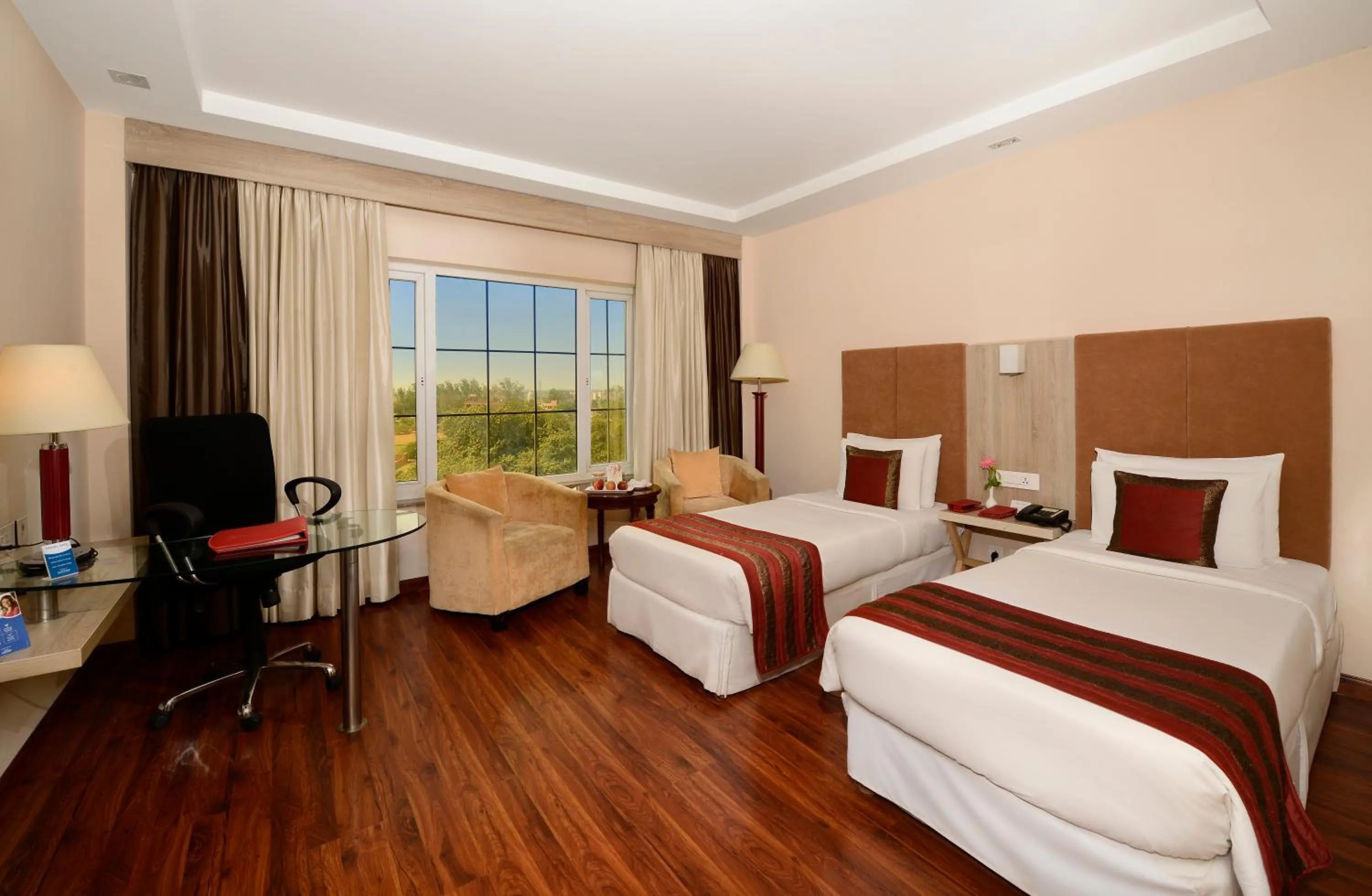 Photo of the whole room, Bed in Nidhivan Sarovar Portico Vrindavan