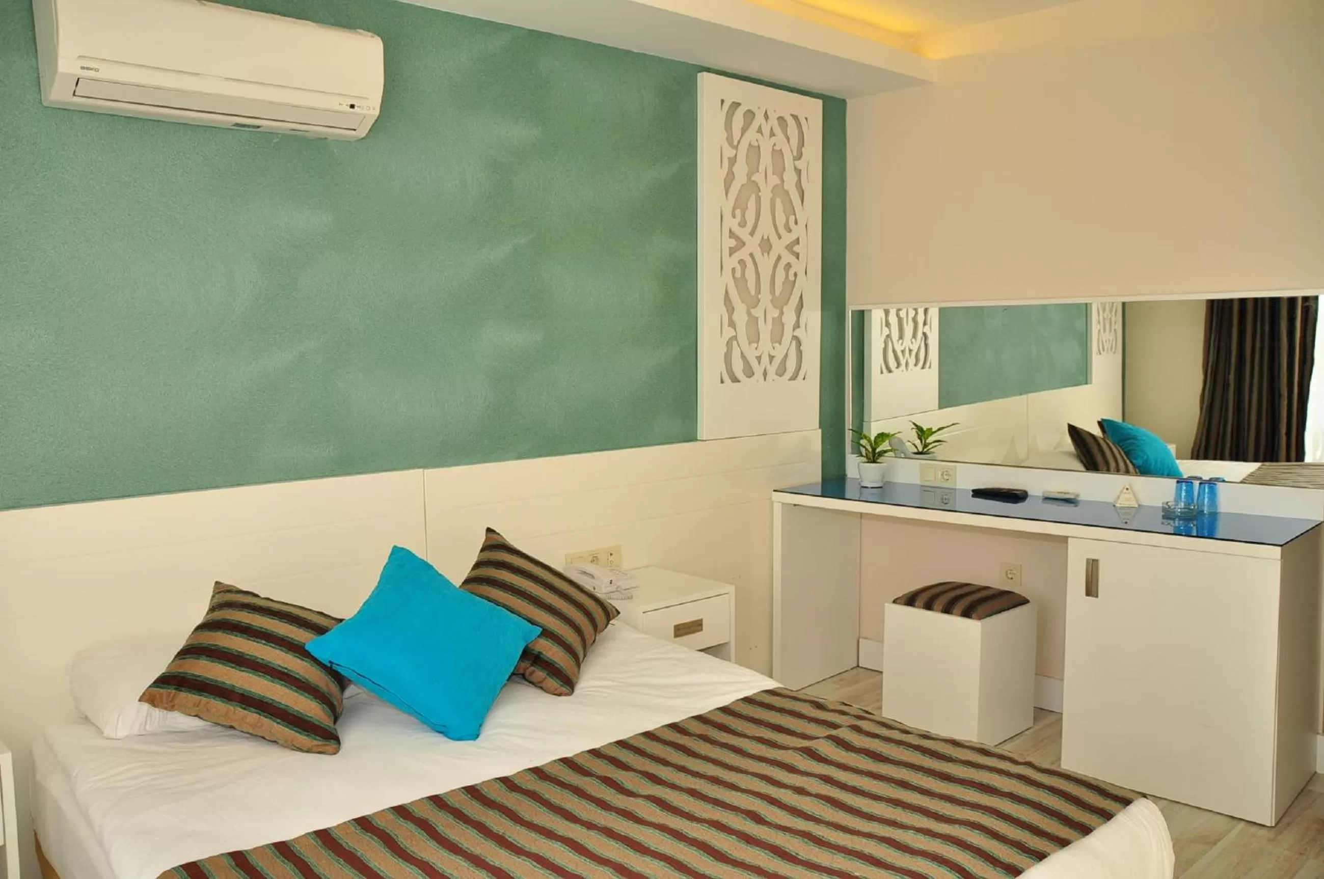 Bed in Aura Boutique Hotel