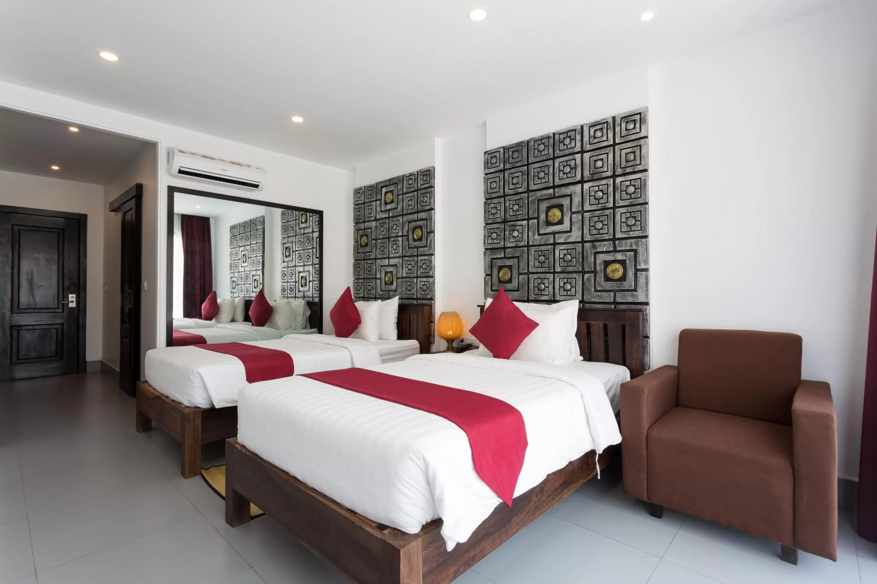 Bed in Ladear Privilege Rooms