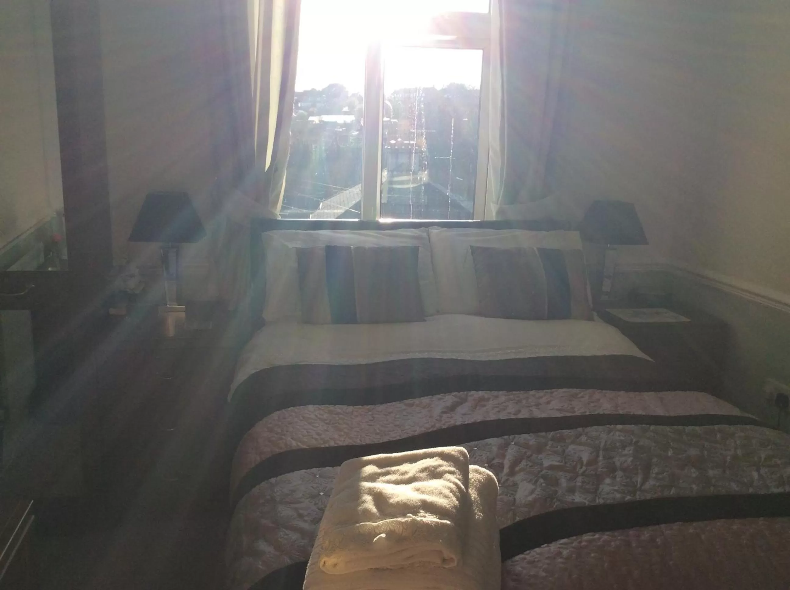 Bed in Alma Lodge Guest House