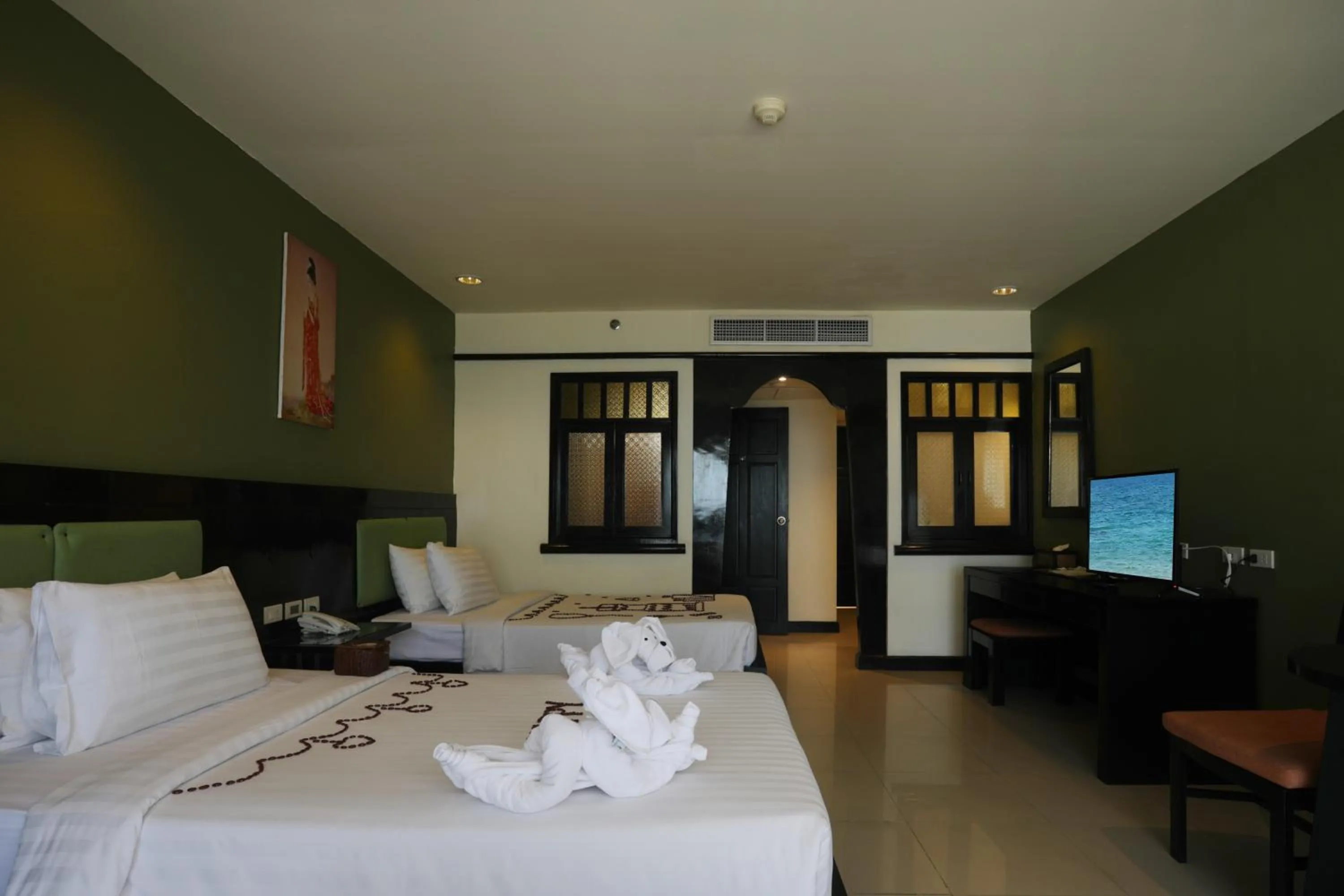 Bed in Woraburi Phuket Resort & Spa - SHA Plus