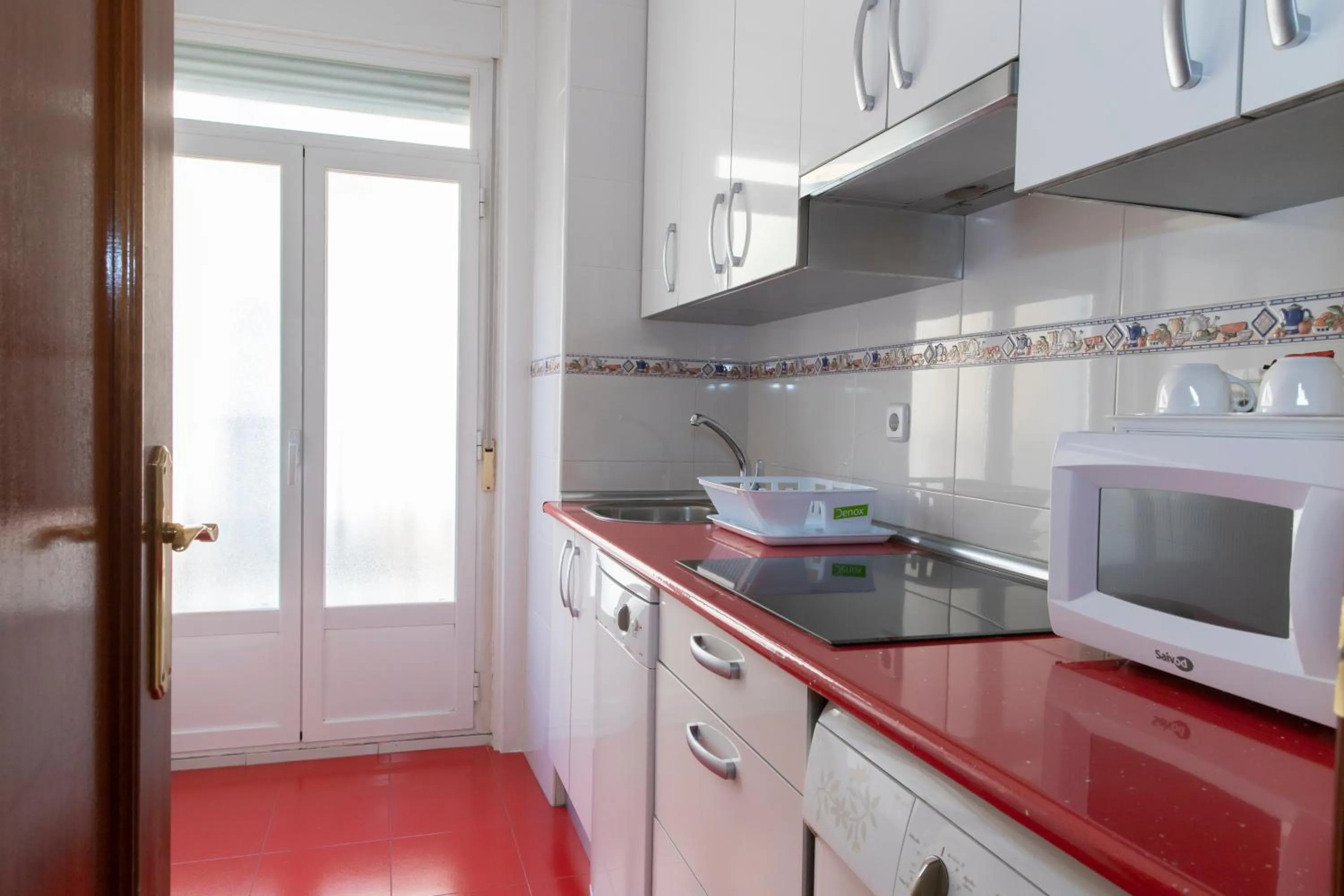 Kitchen or kitchenette in Hostal Tokio