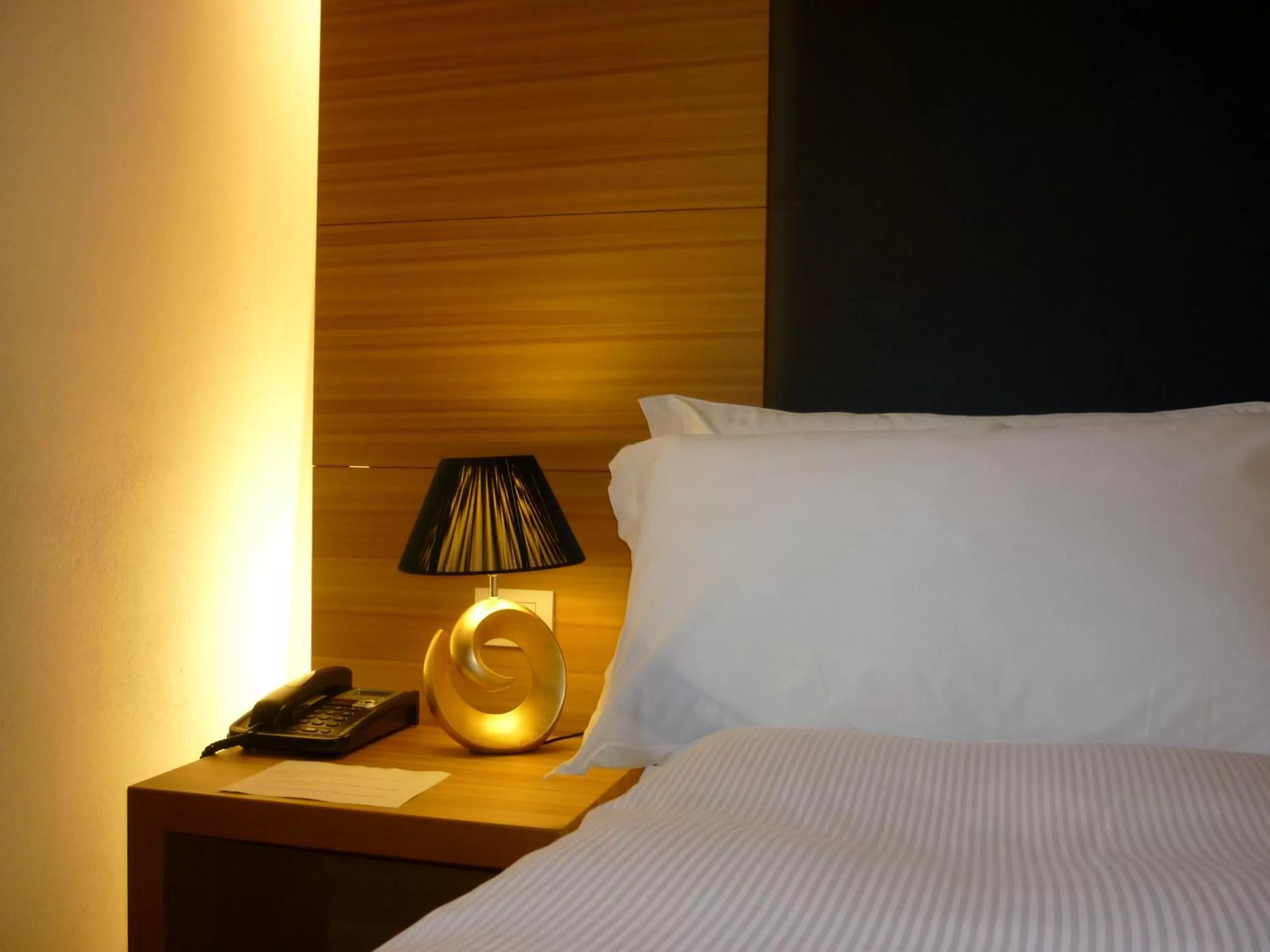 Bed in Relais Palazzo Lodron