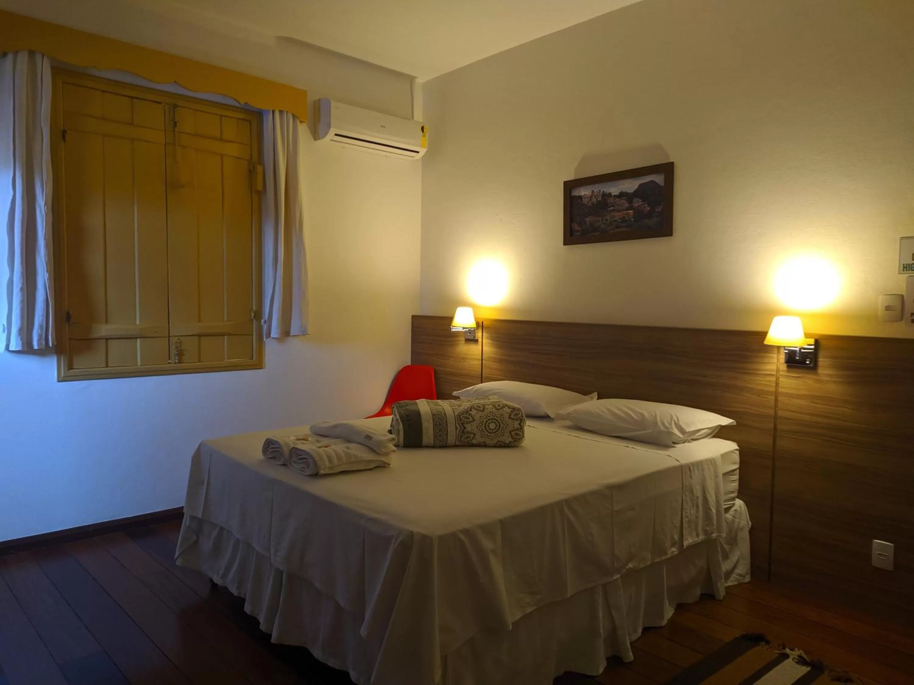 Bed in Pousada o Amanhecer