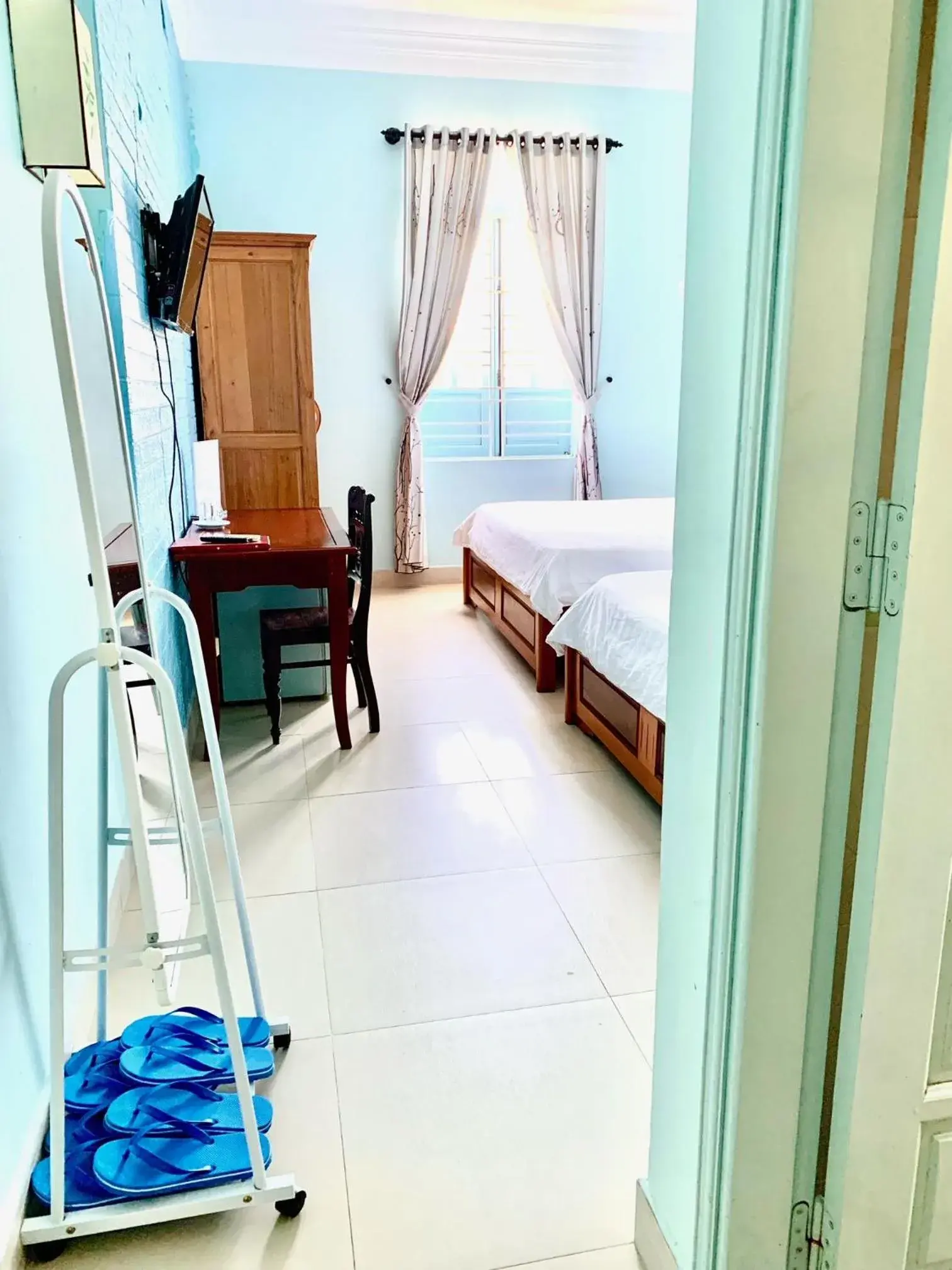 Deluxe Triple Room in Areca Homestay Deluxe Triple Room in Areca Homestay