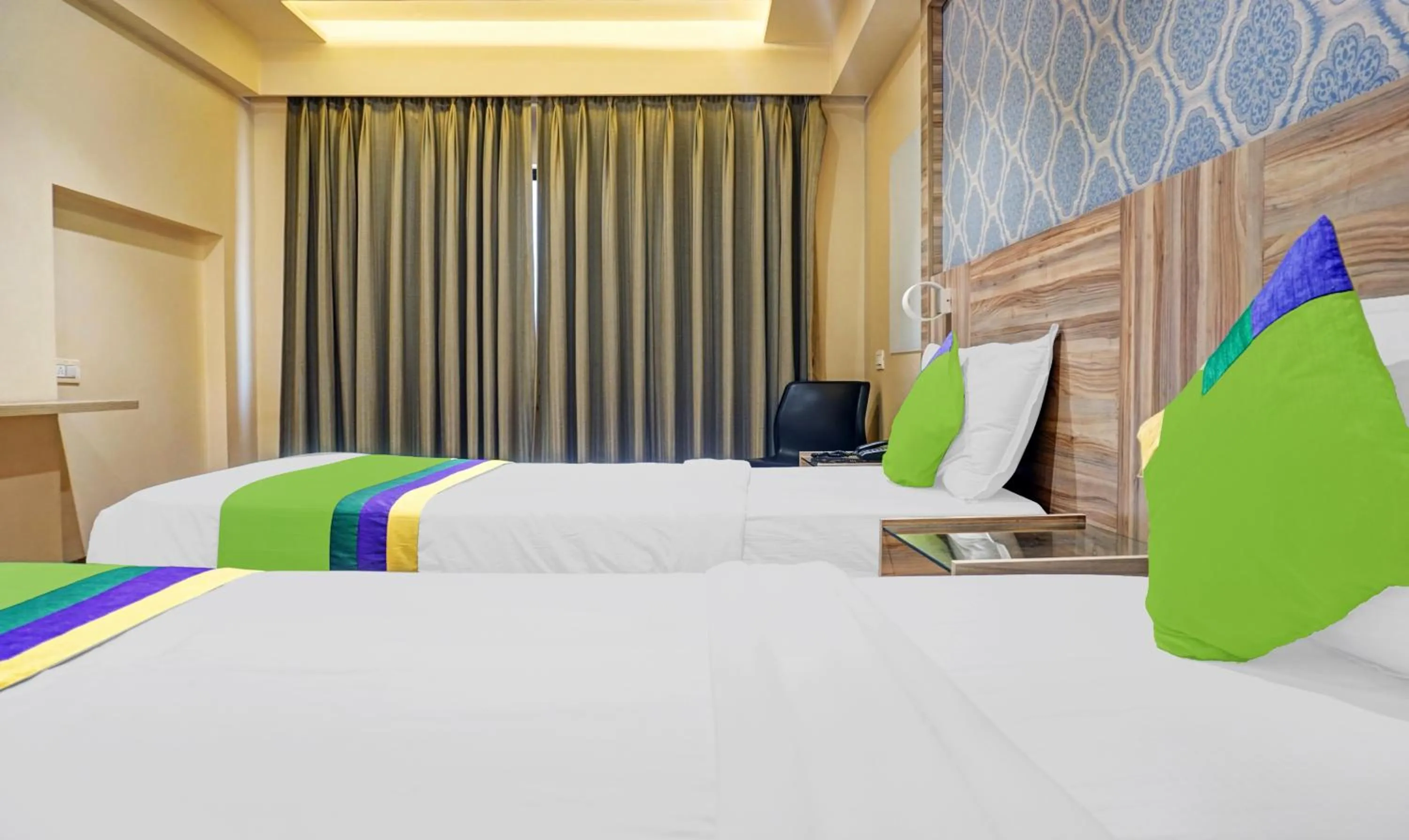 Bedroom, Bed in Treebo Classic Grande, Camp