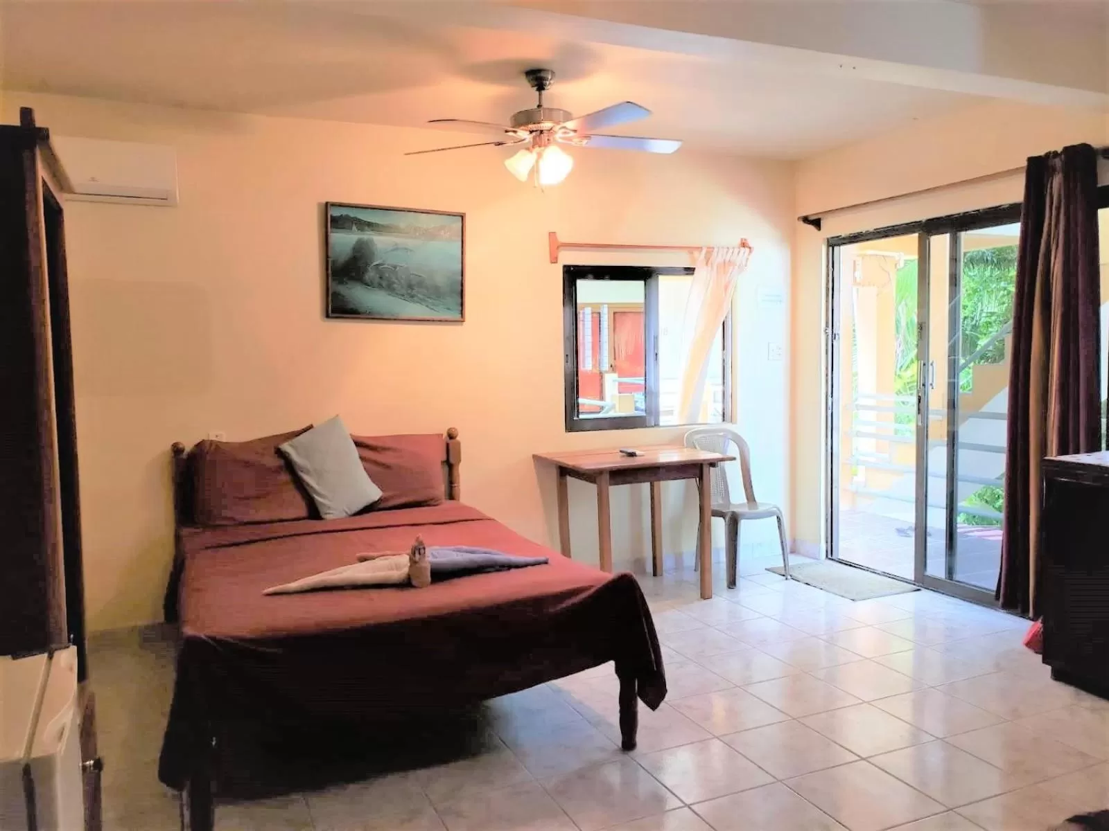 Bed in Beach Side Condos Caye Caulker by CCVH