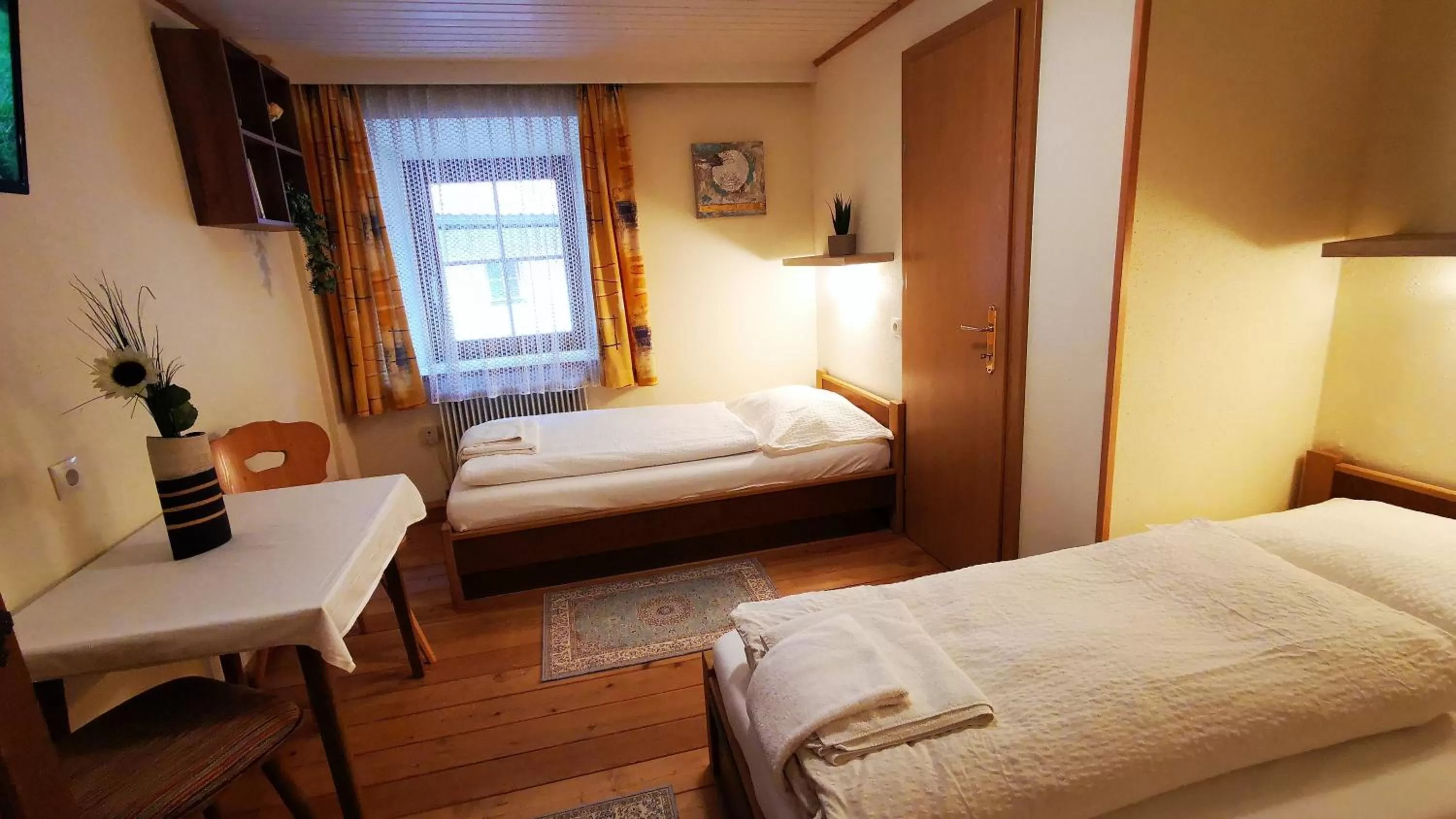 Bed, Seating Area in Gasthof Geronimo