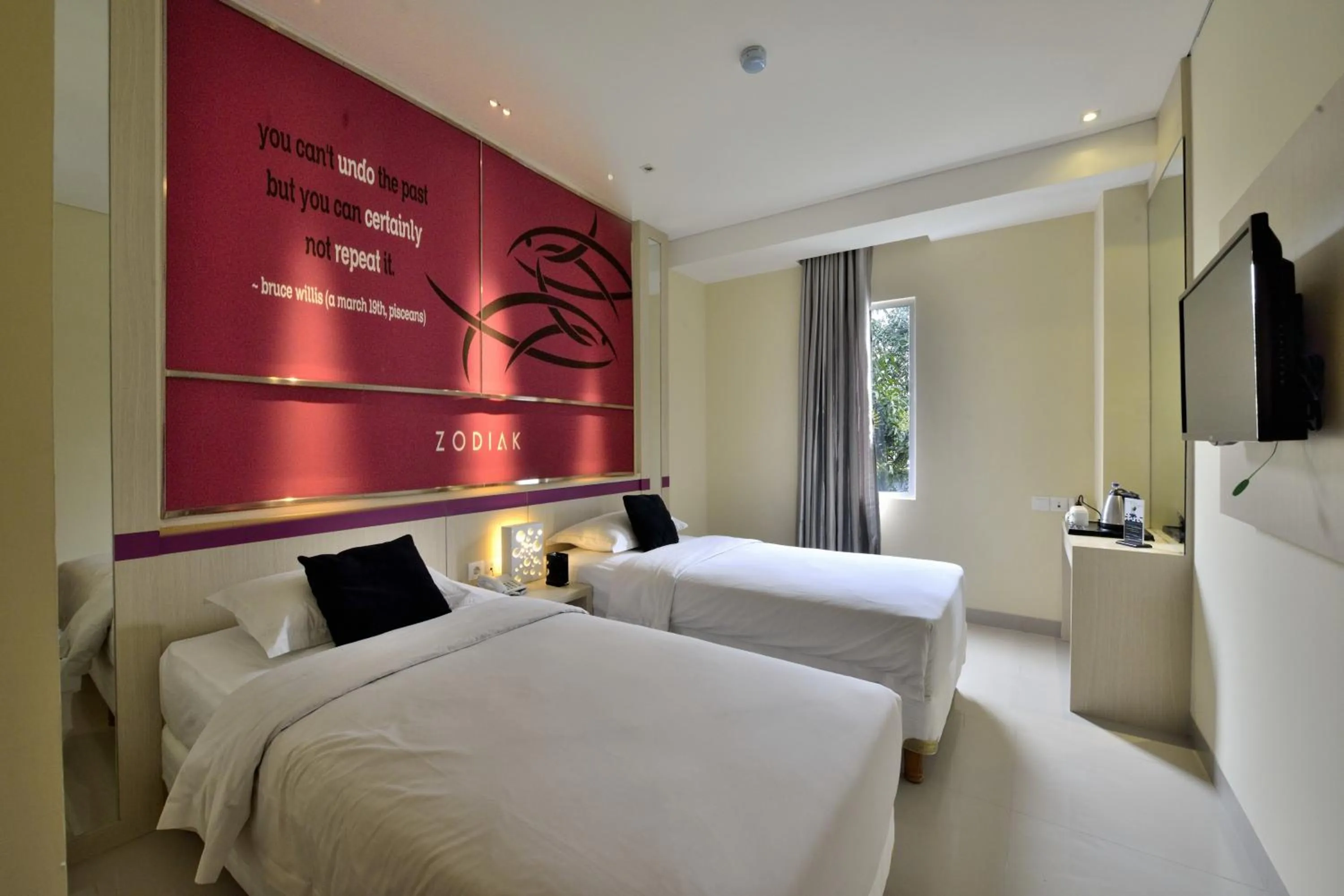 Bedroom, Bed in Zodiak Kebon Kawung by KAGUM Hotels