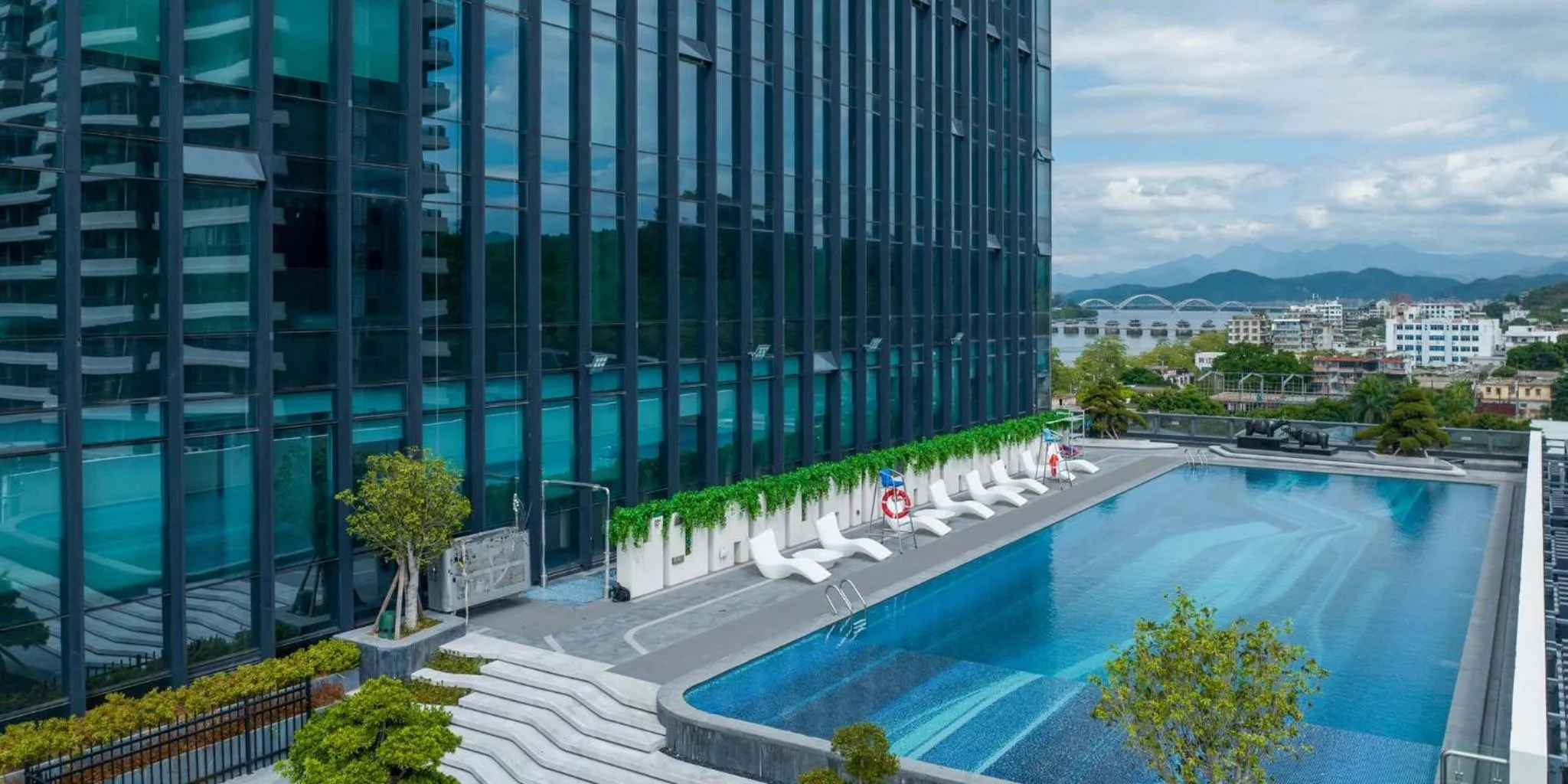 Swimming pool in Crowne Plaza Chaozhou Riverside by IHG