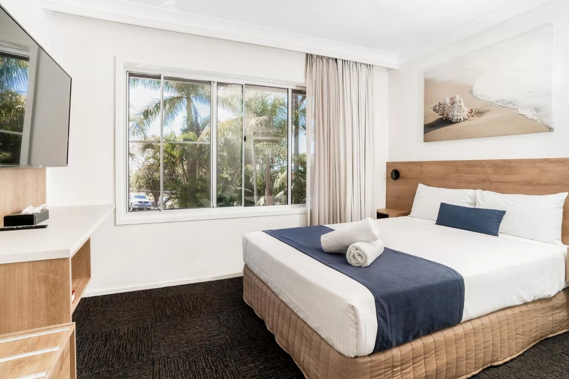 Bed in Caribbean Motel