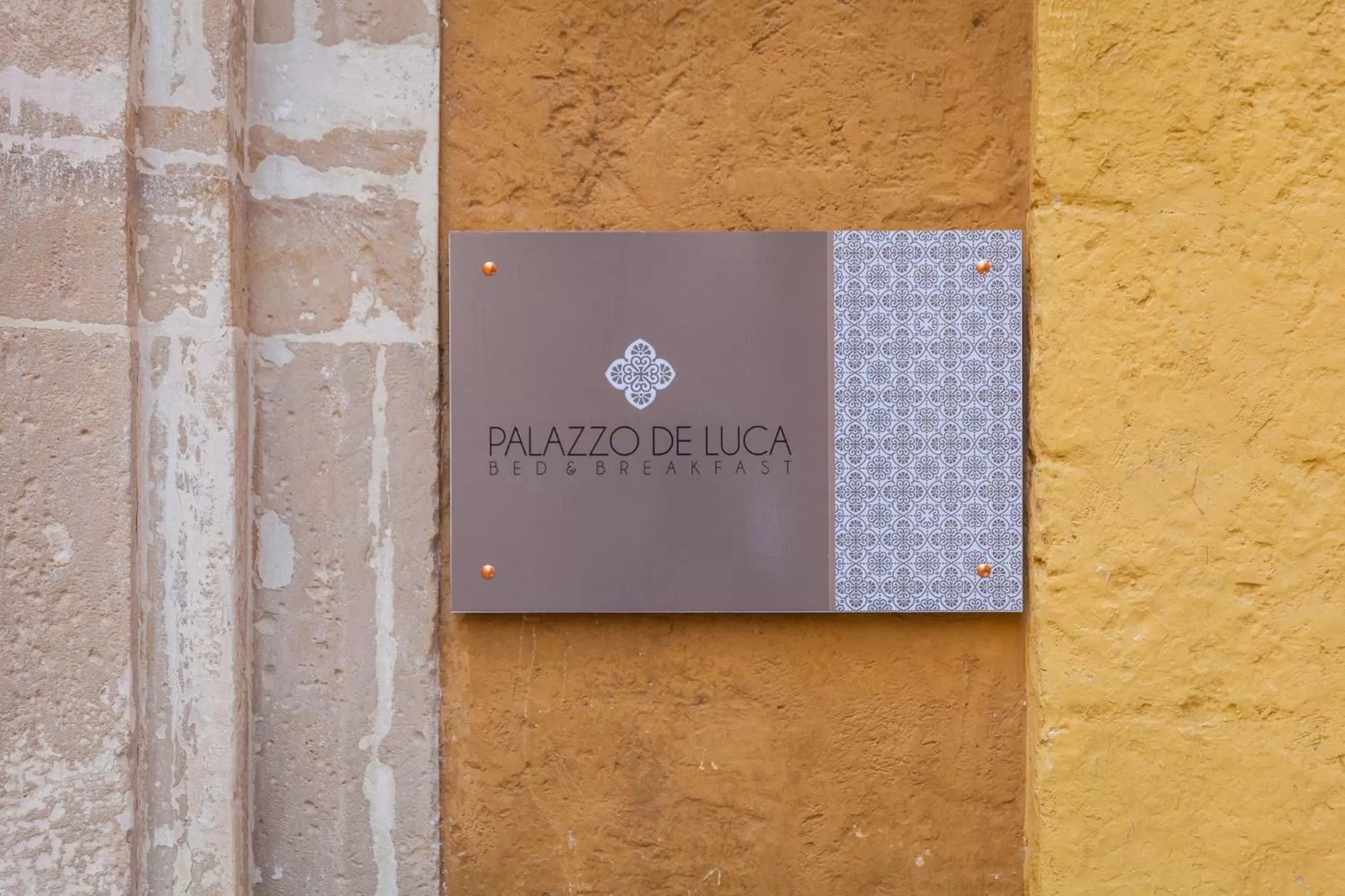 Property logo or sign in Palazzo De Luca by Apulia Hospitality