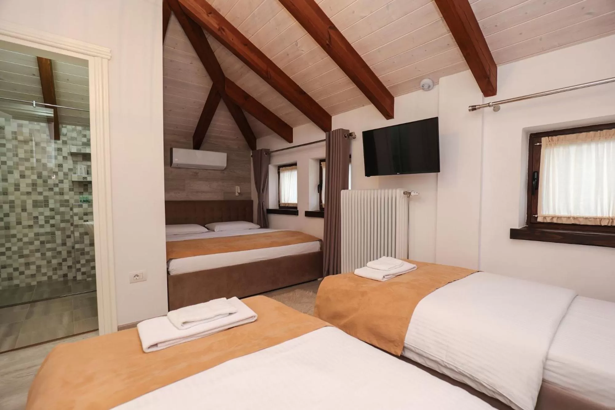 Photo of the whole room, Bed in Bujtina Oxhaku