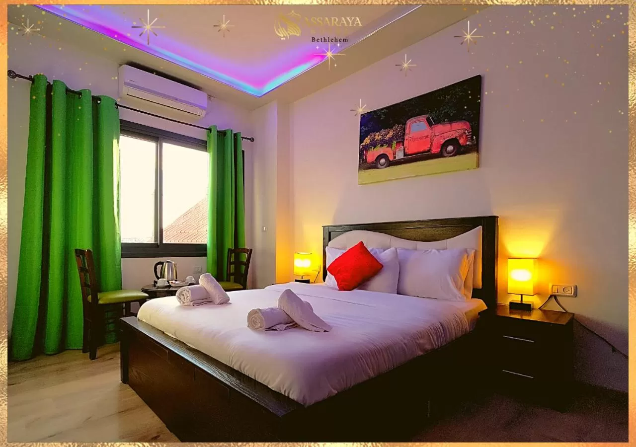 Bed in Assaraya Palace Hotel