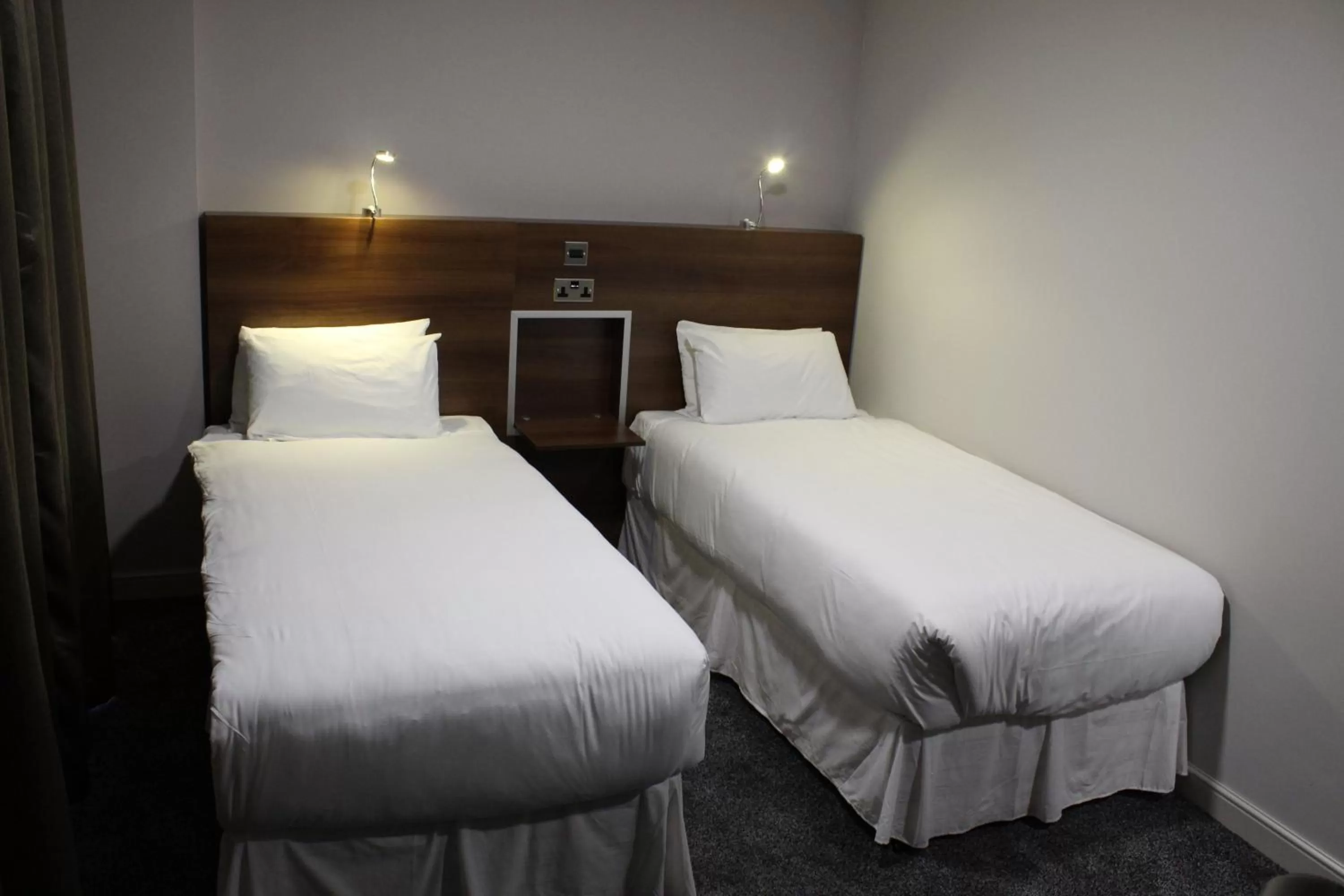 Bed in Milton Manchester Hotel