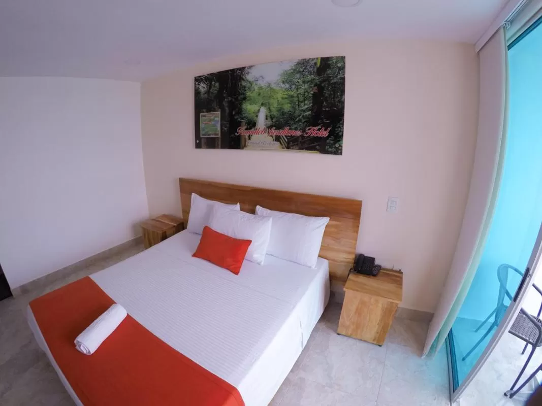 Bed in Kamaleb Farallones Hotel