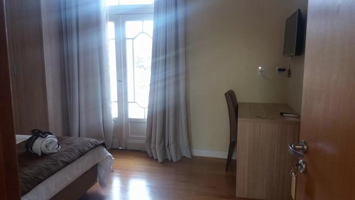 Photo of the whole room, Seating Area in Hotel Praça da Matriz