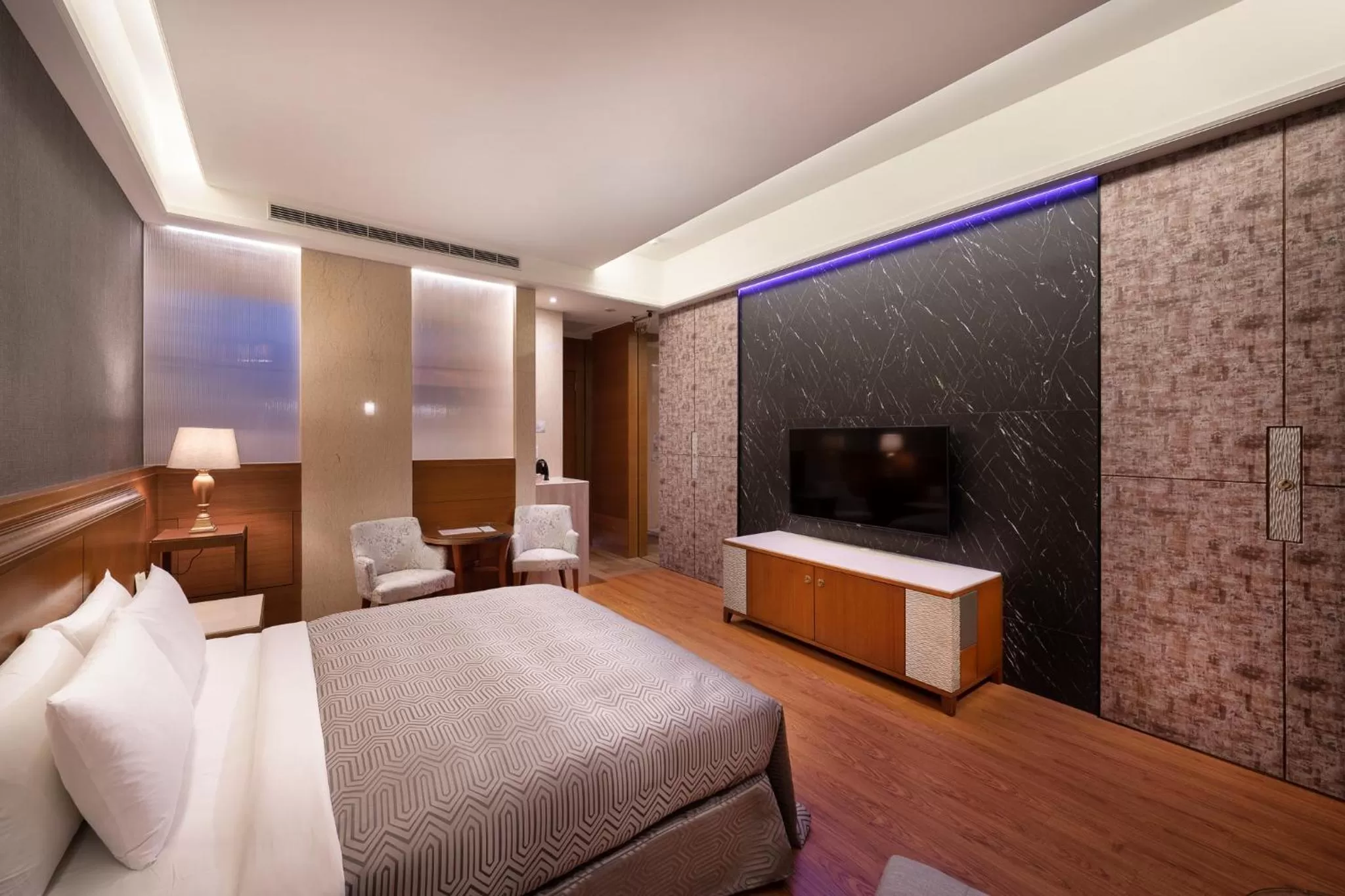 TV/Entertainment Center in Purple Garden Motel