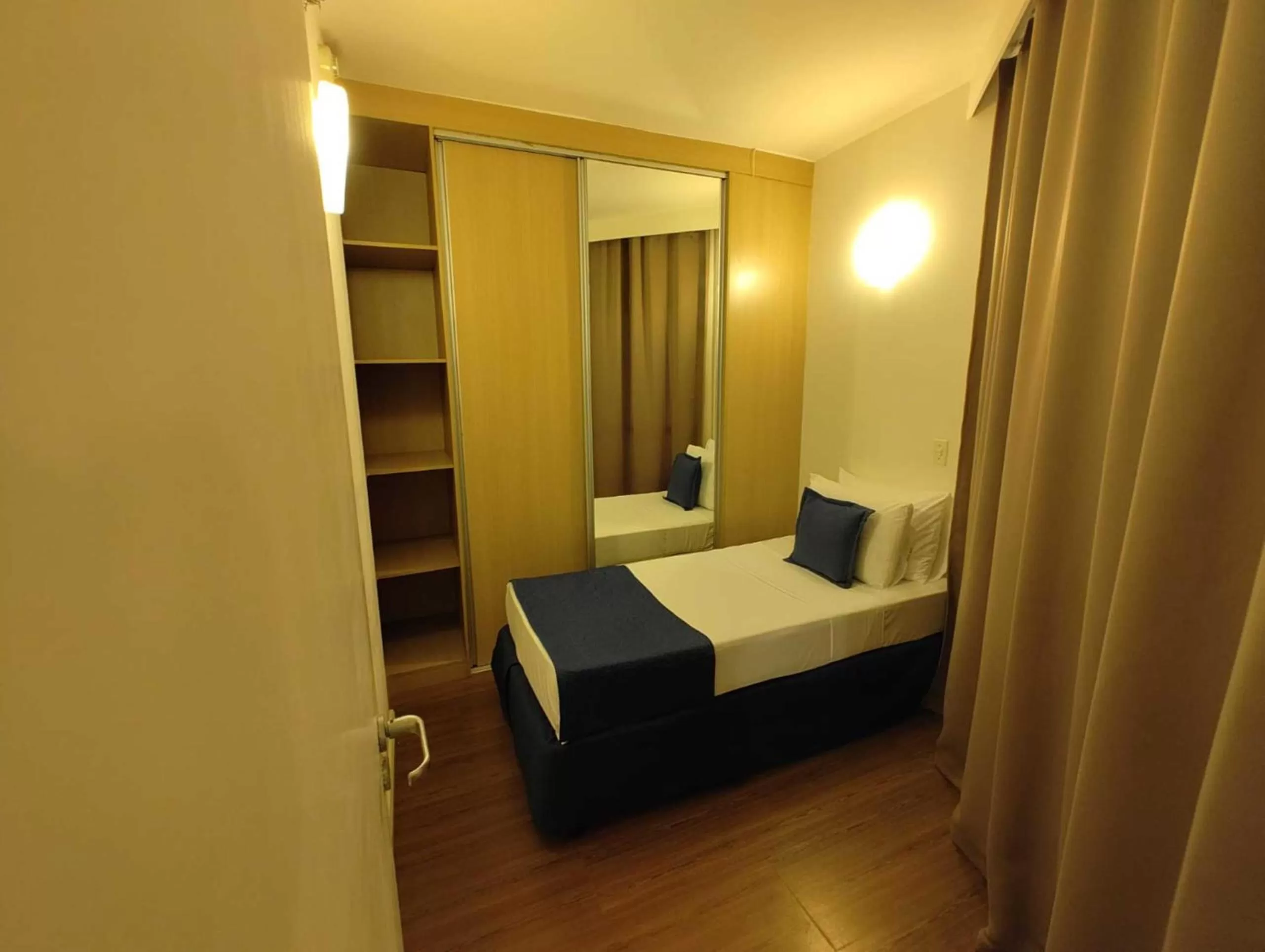 Photo of the whole room, Bed in Summit Suítes Hotel Santos