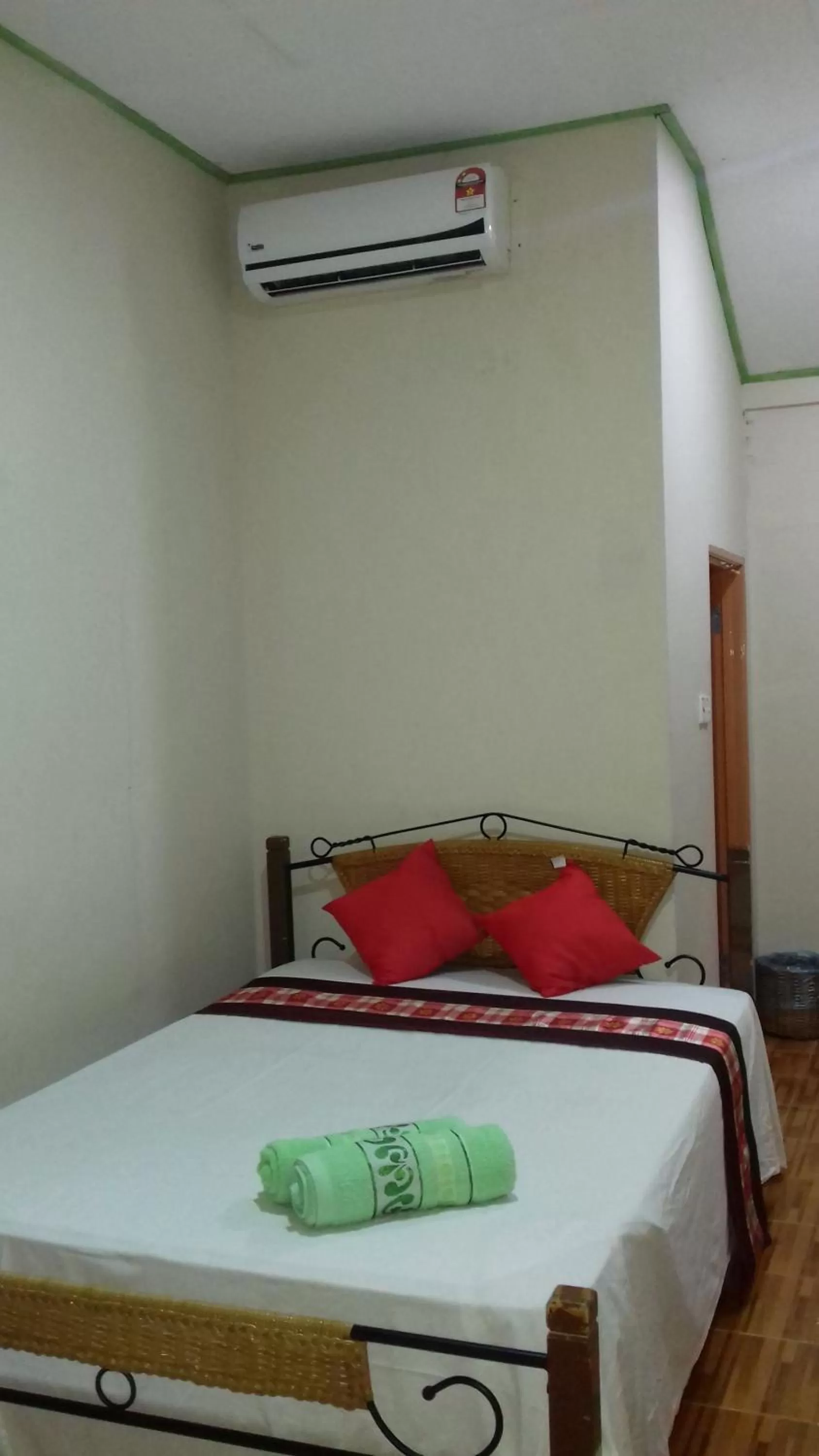 Bed in Mai Chenang Guesthouse