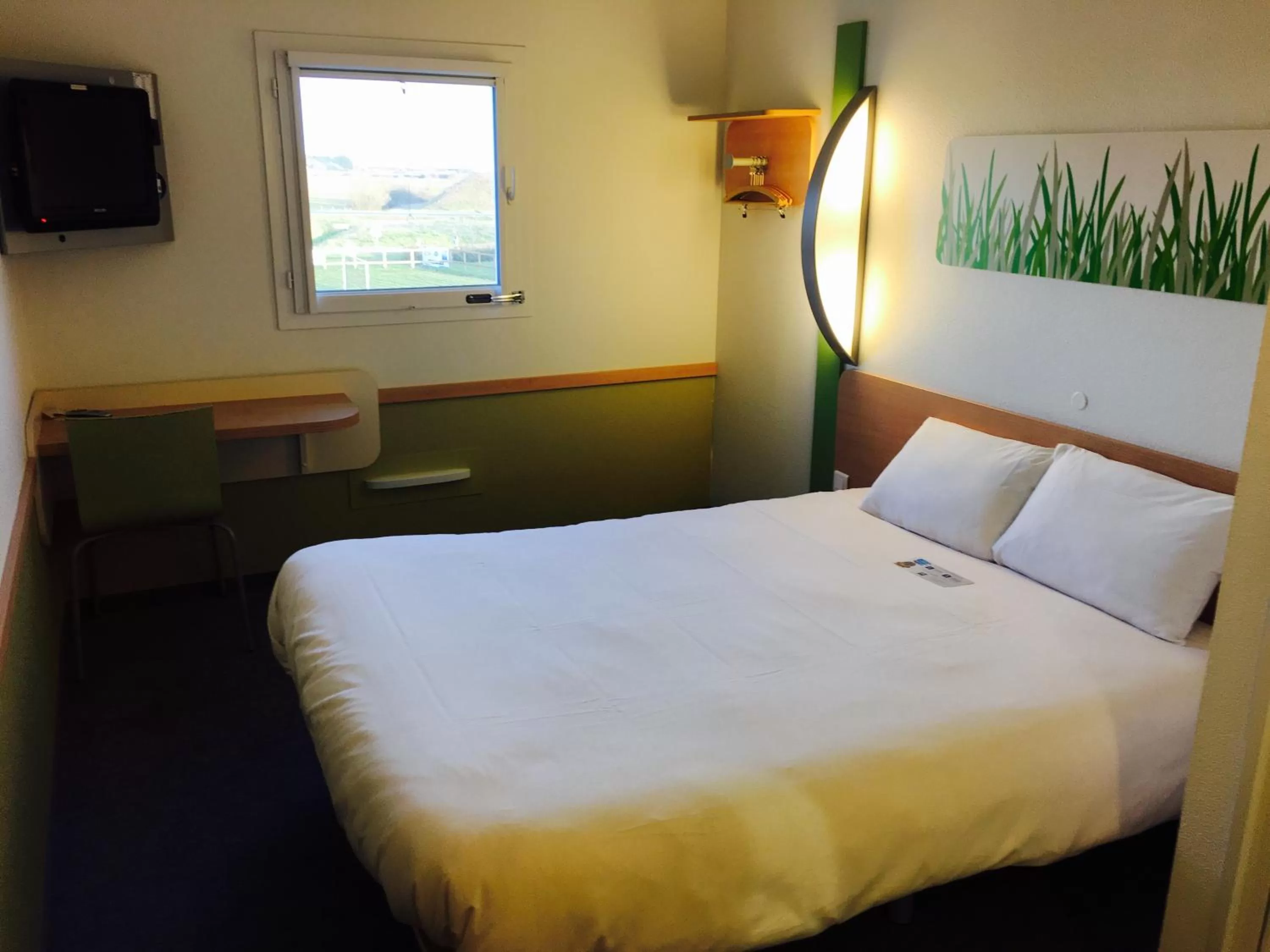 Bed in Ibis Budget Ancenis