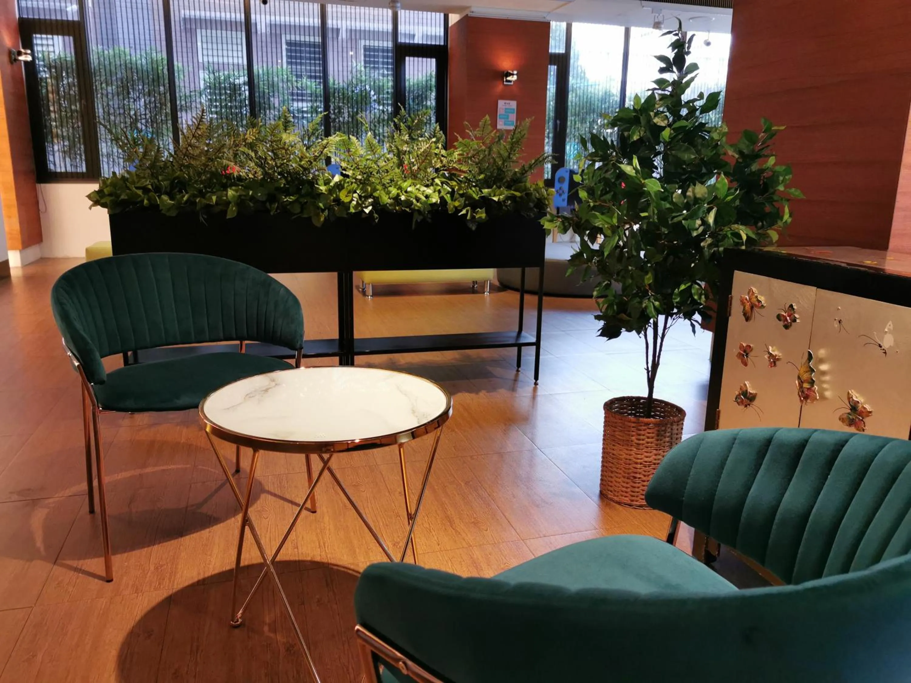 Communal lounge/ TV room, Seating Area in Azure Hotel