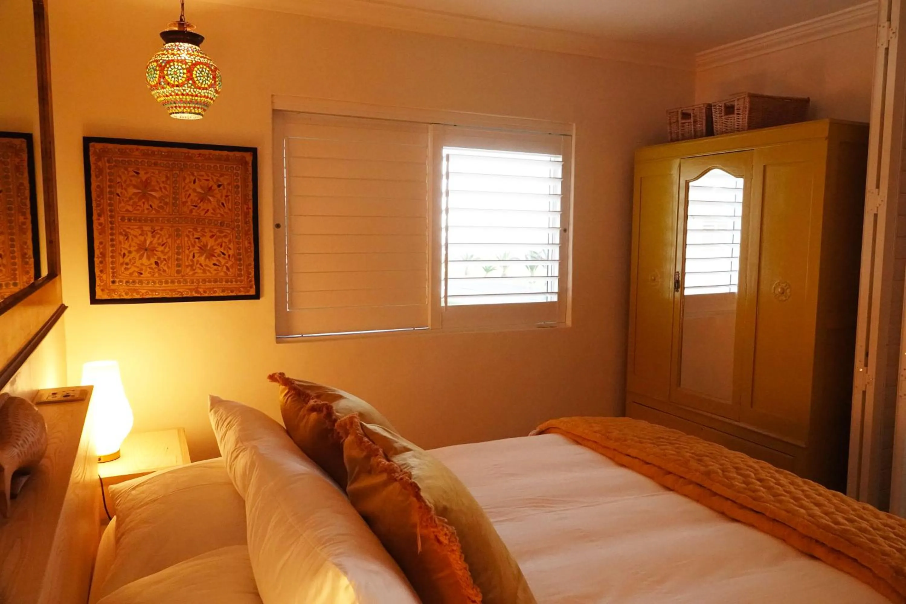 Bed in Dolphin Inn Guesthouse