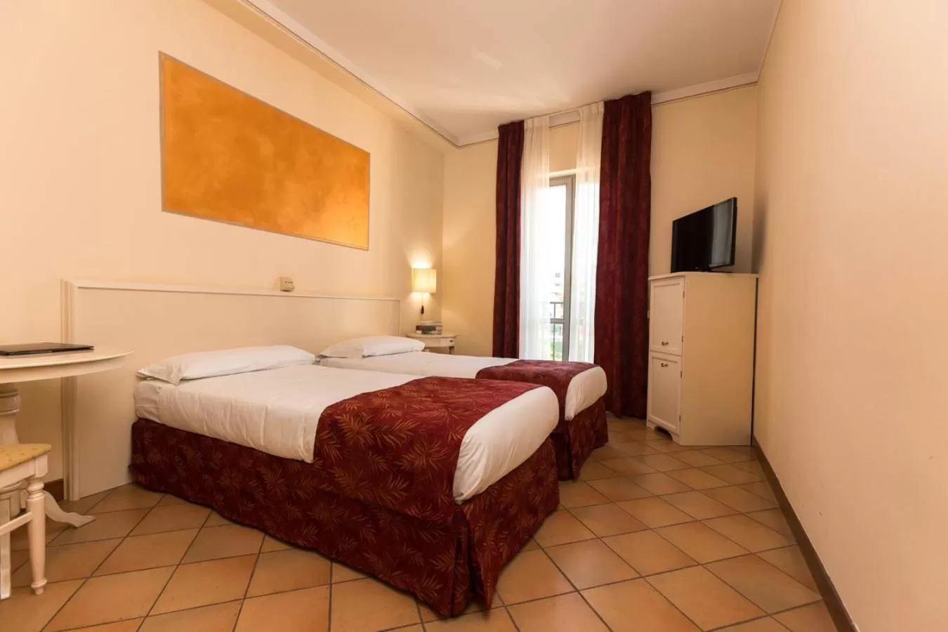 Bed in Hotel Le Mura