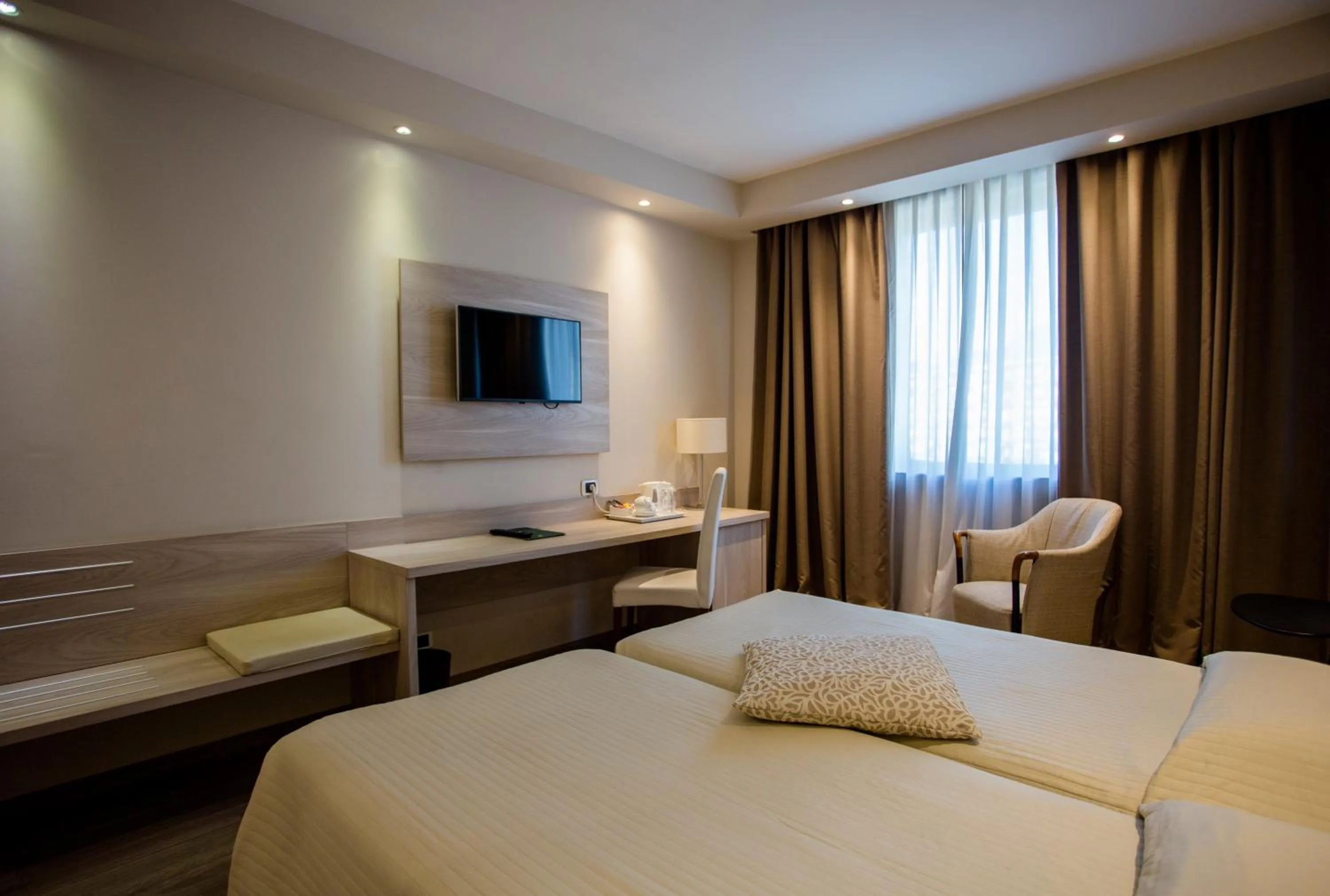 Bed in Hostellerie Du Cheval Blanc