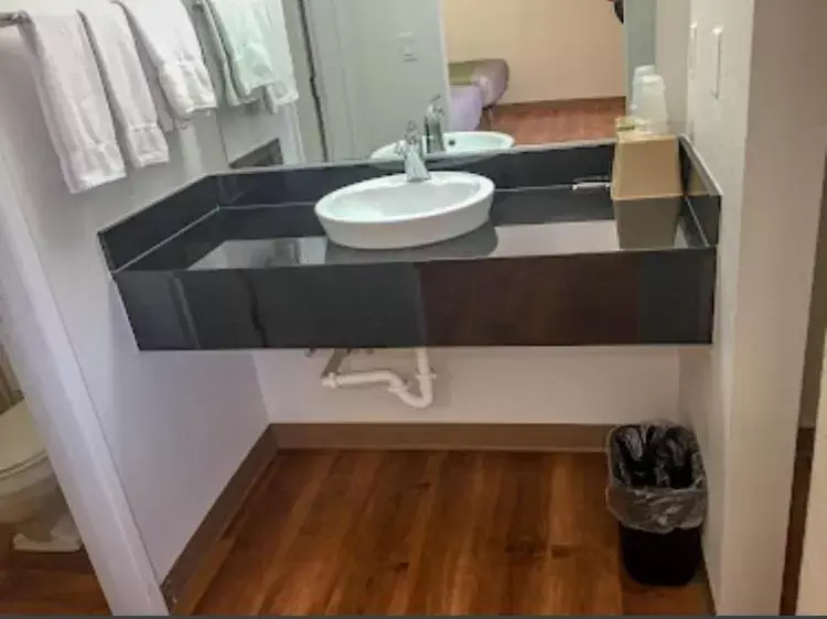 Standard Queen Room with Two Queen Beds in American Inn Standard Queen Room with Two Queen Beds in American Inn