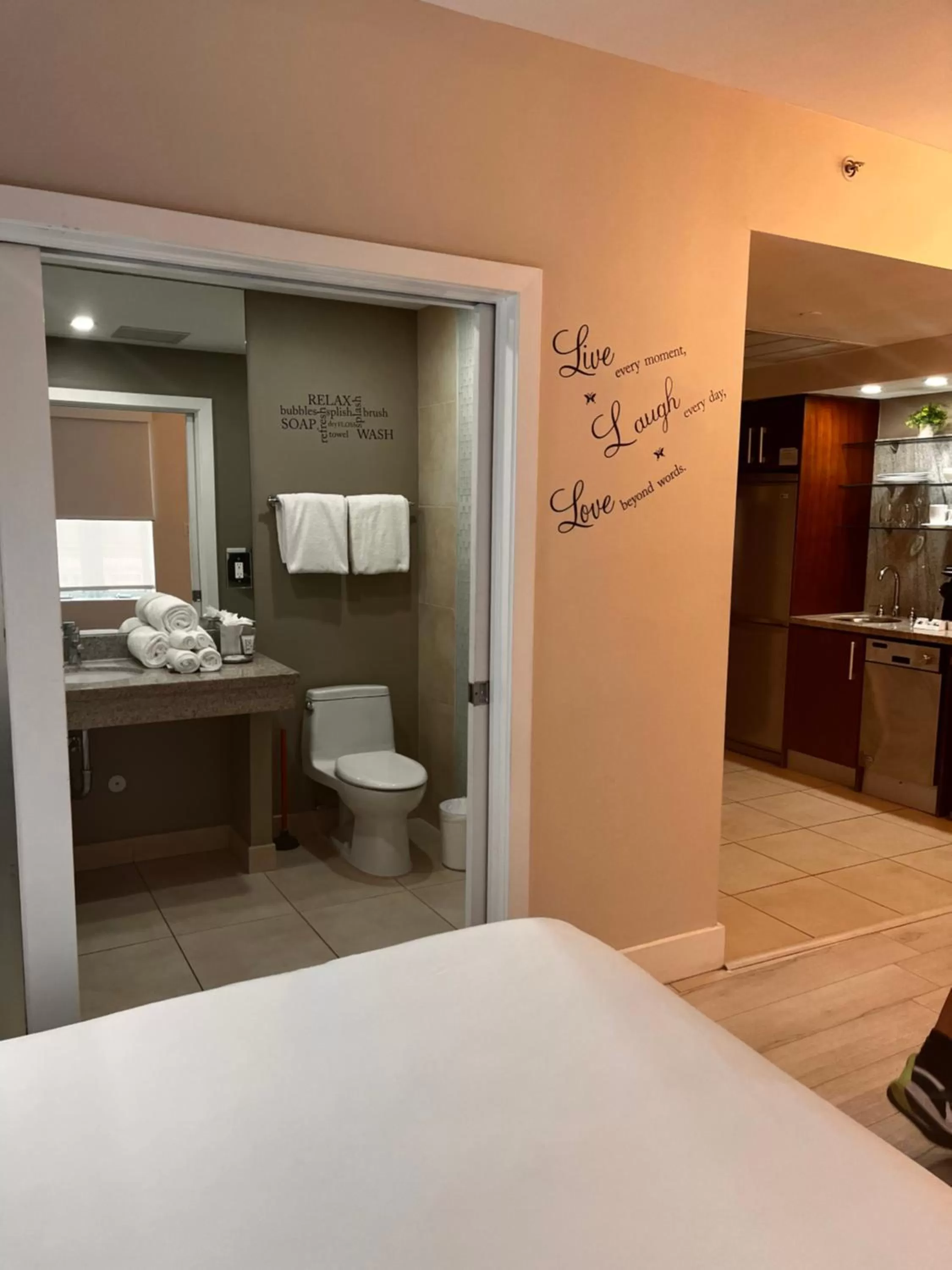 Bedroom, Bathroom in Suites at The Strand on Ocean Drive