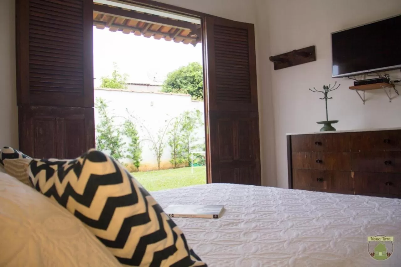 Bed in Pousada Nossa Terra