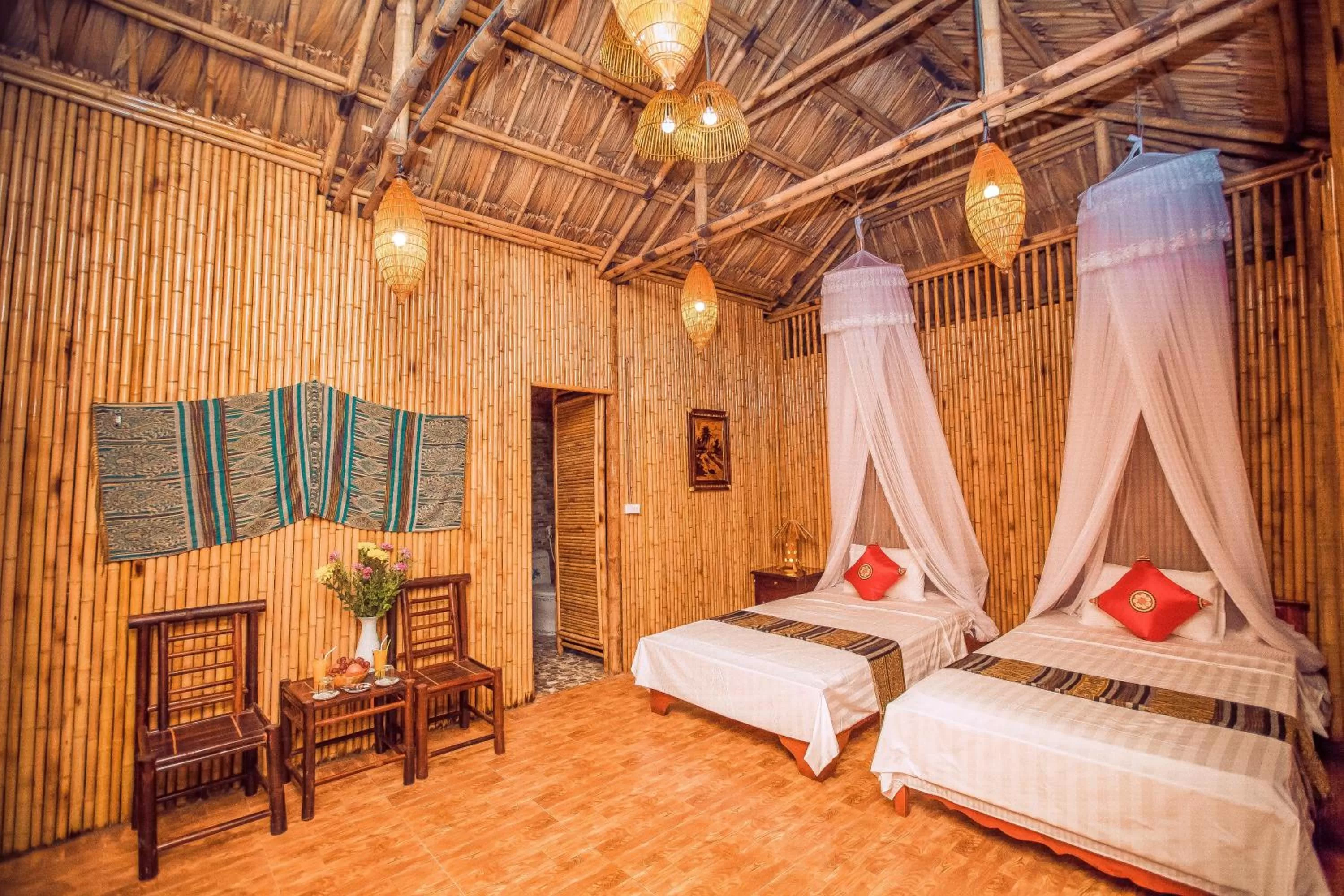 Photo of the whole room, Bed in Tam Coc Rice Fields Resort