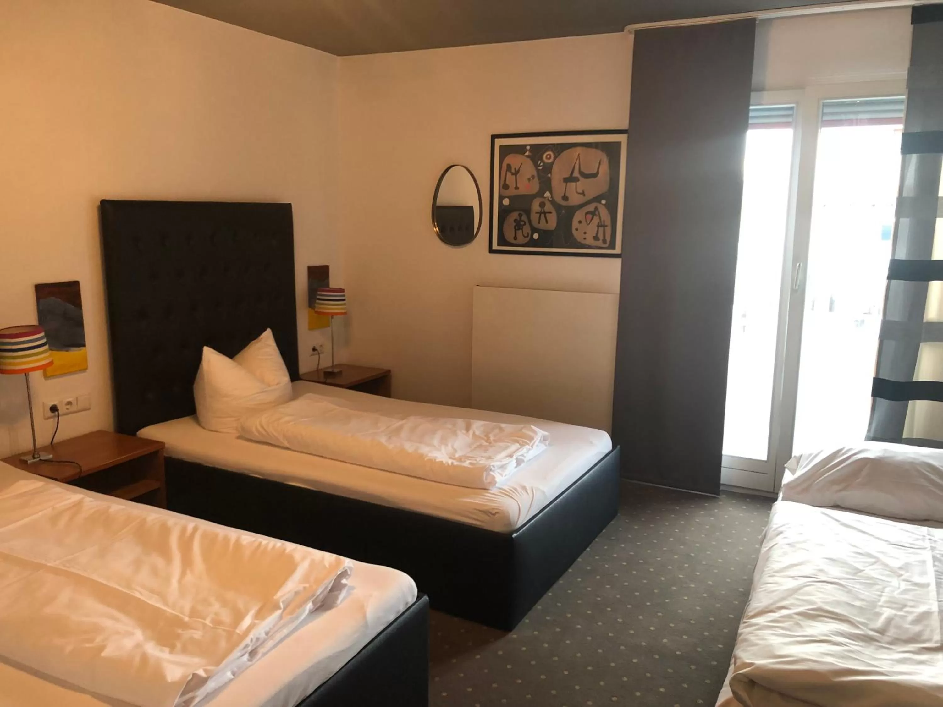 Photo of the whole room, Bed in Arthotel Restaurant Pfeffermühle