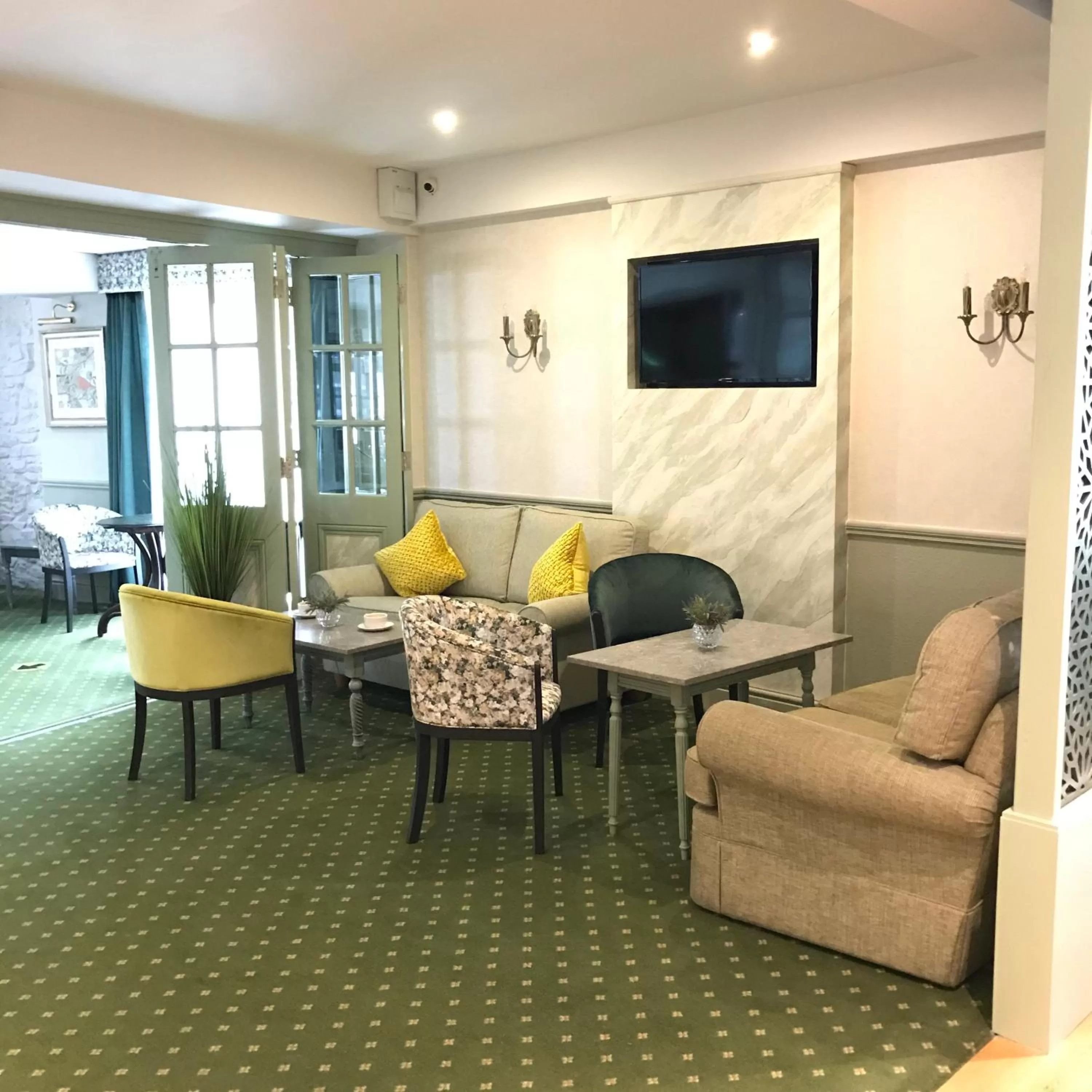 Seating area in Falcon Hotel