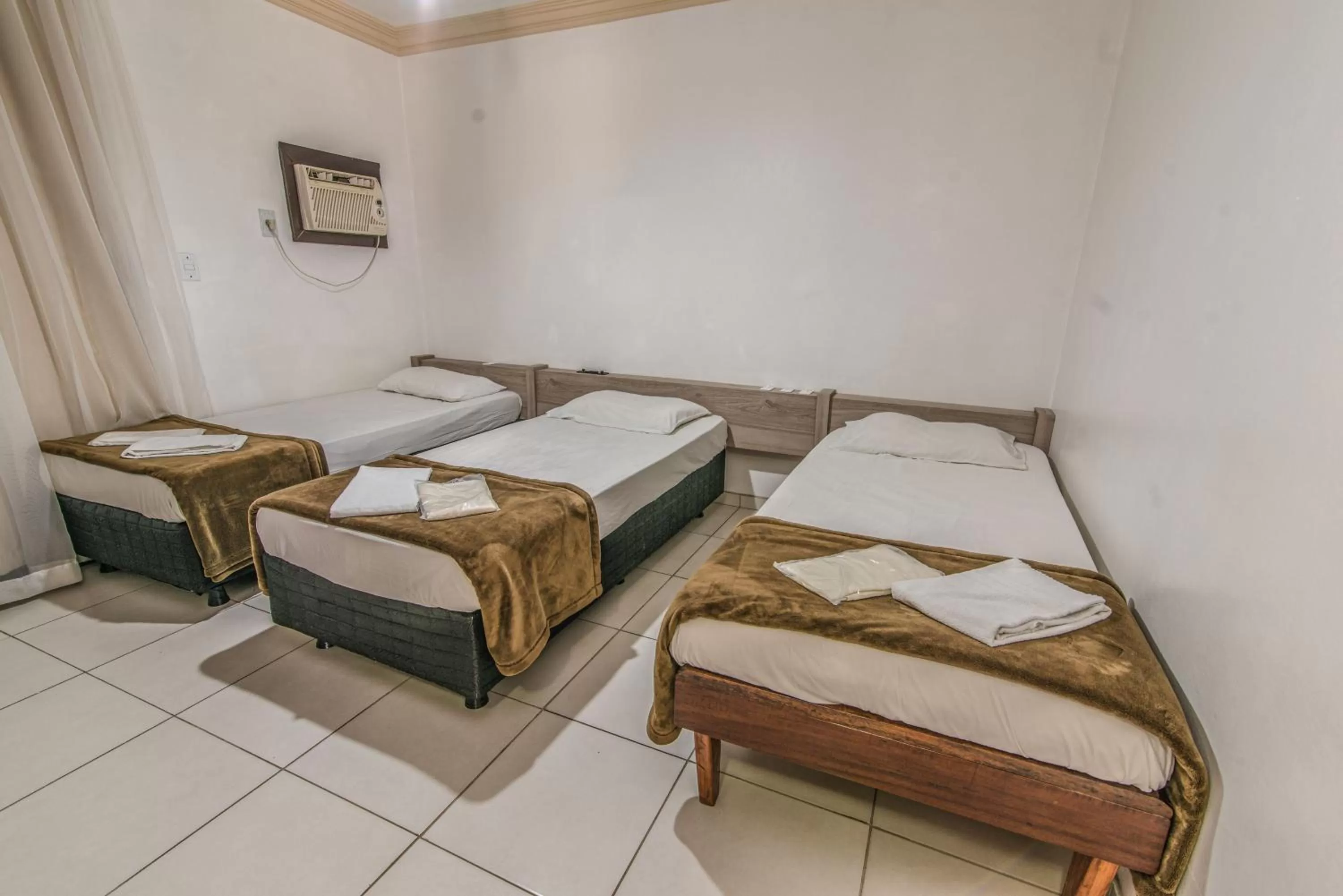 Bed in Classic Hotel e Motel