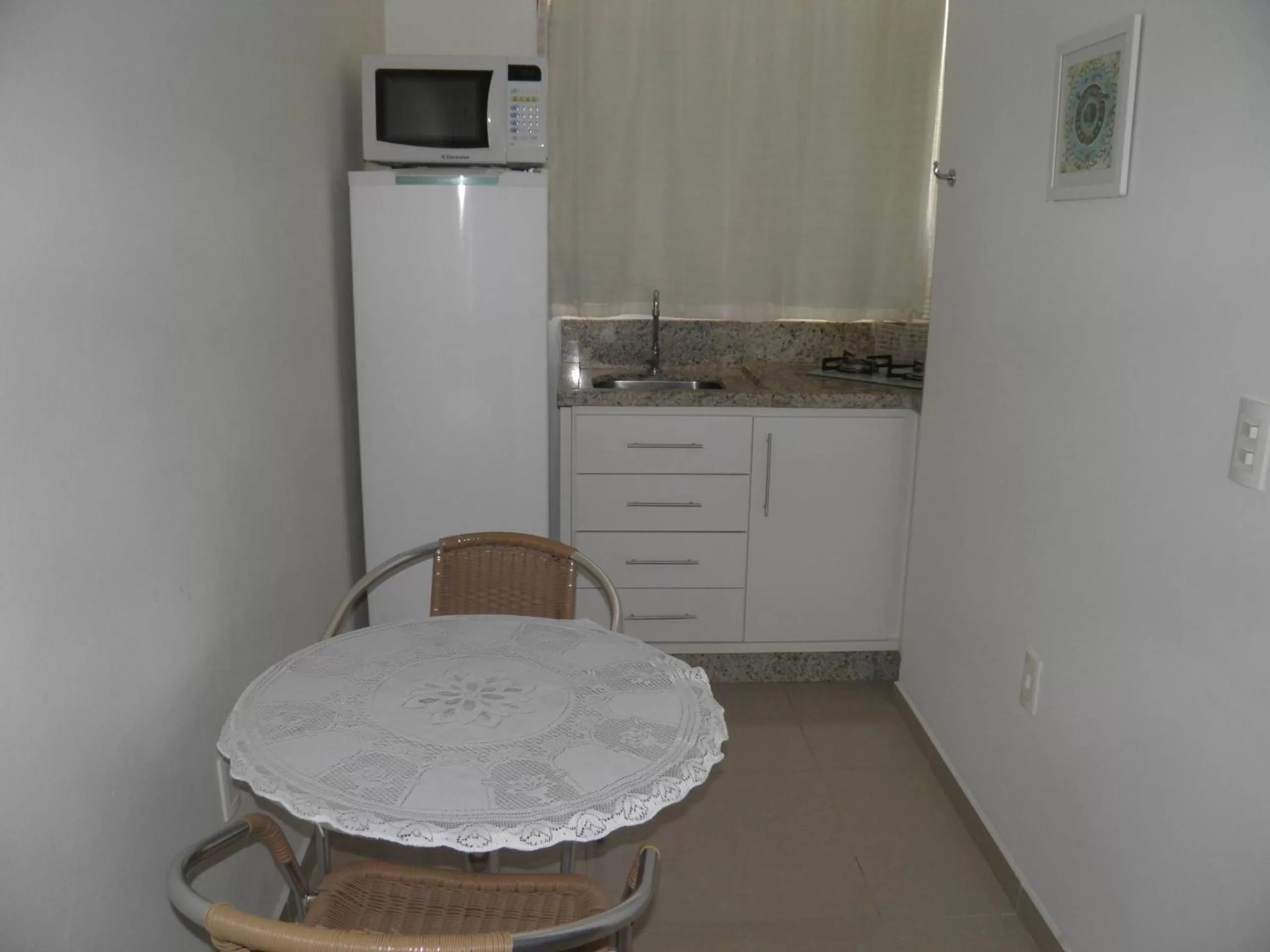 Dining area, Kitchen/Kitchenette in Pousada Mar de Cristal
