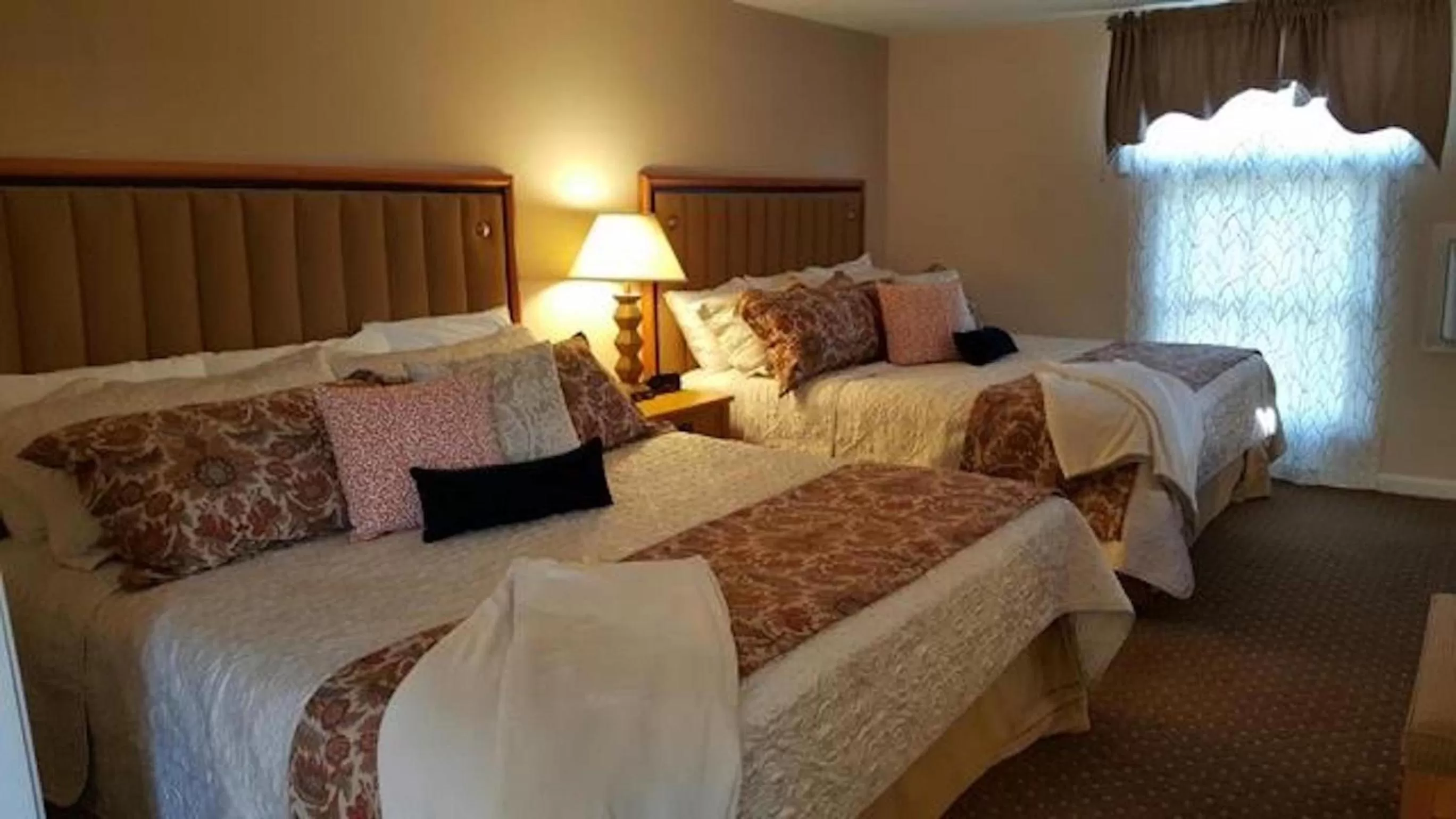 Bed in Starlight Lodge Cape Cod