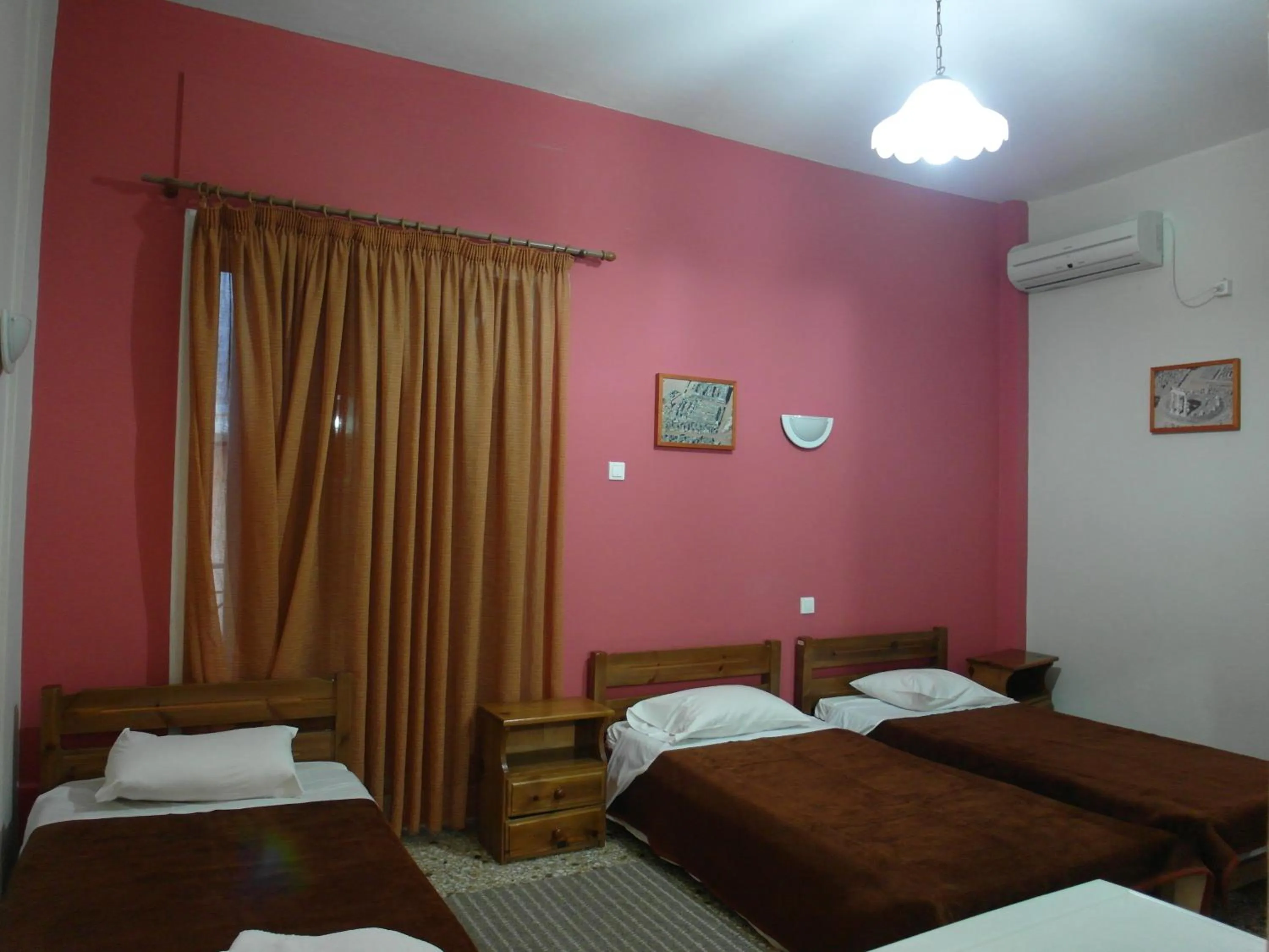 Bed in Hotel Alexandrion